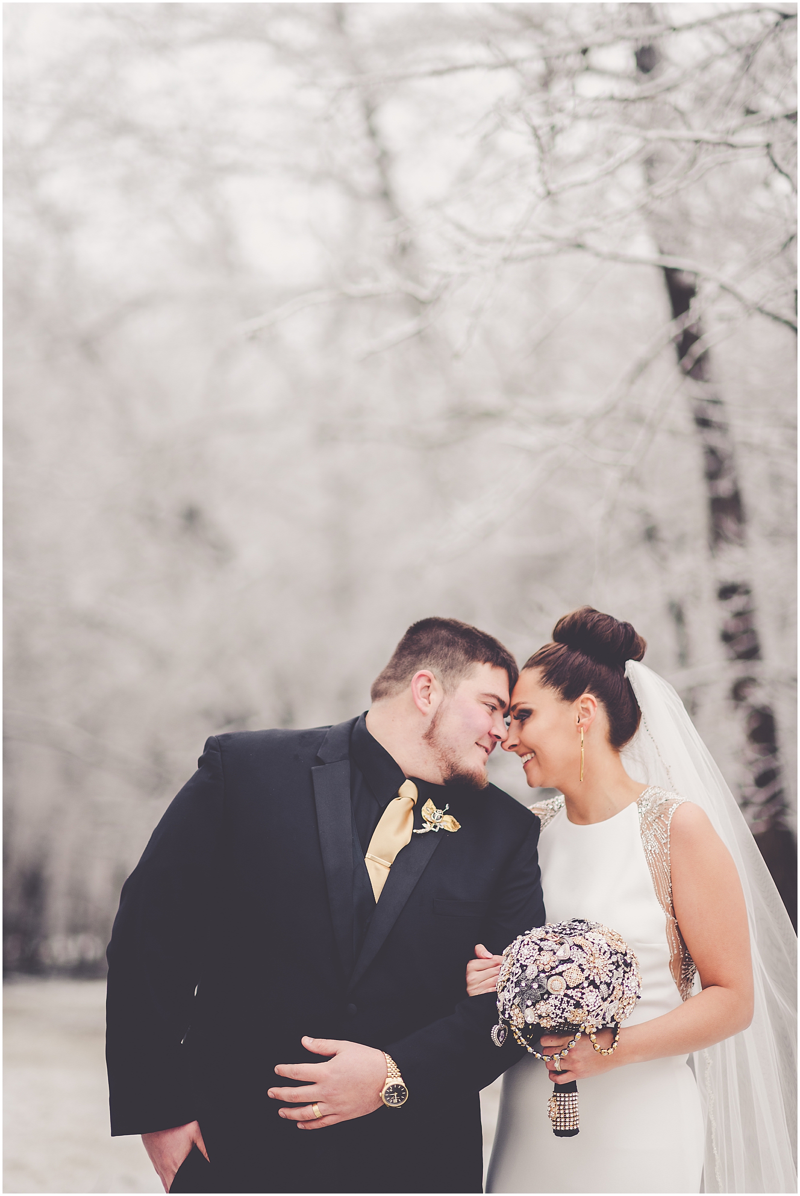Holly and Kolton's snowy winter wedding day at The Longbranch in L'erable with Chicagoland wedding photographer Kara Evans Photographer.