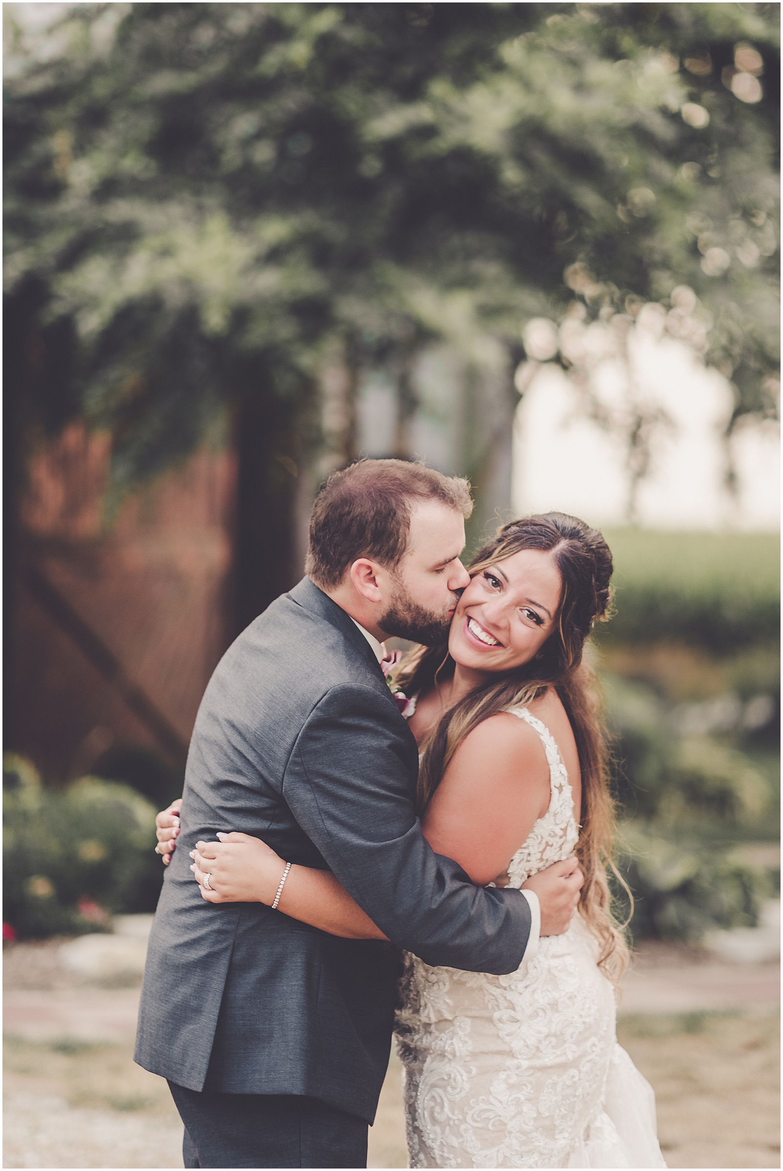 Daniela and Andrew's romantic August wedding at The Mora Farm in Waterman, IL with Chicagoland wedding photographer Kara Evans Photographer.
