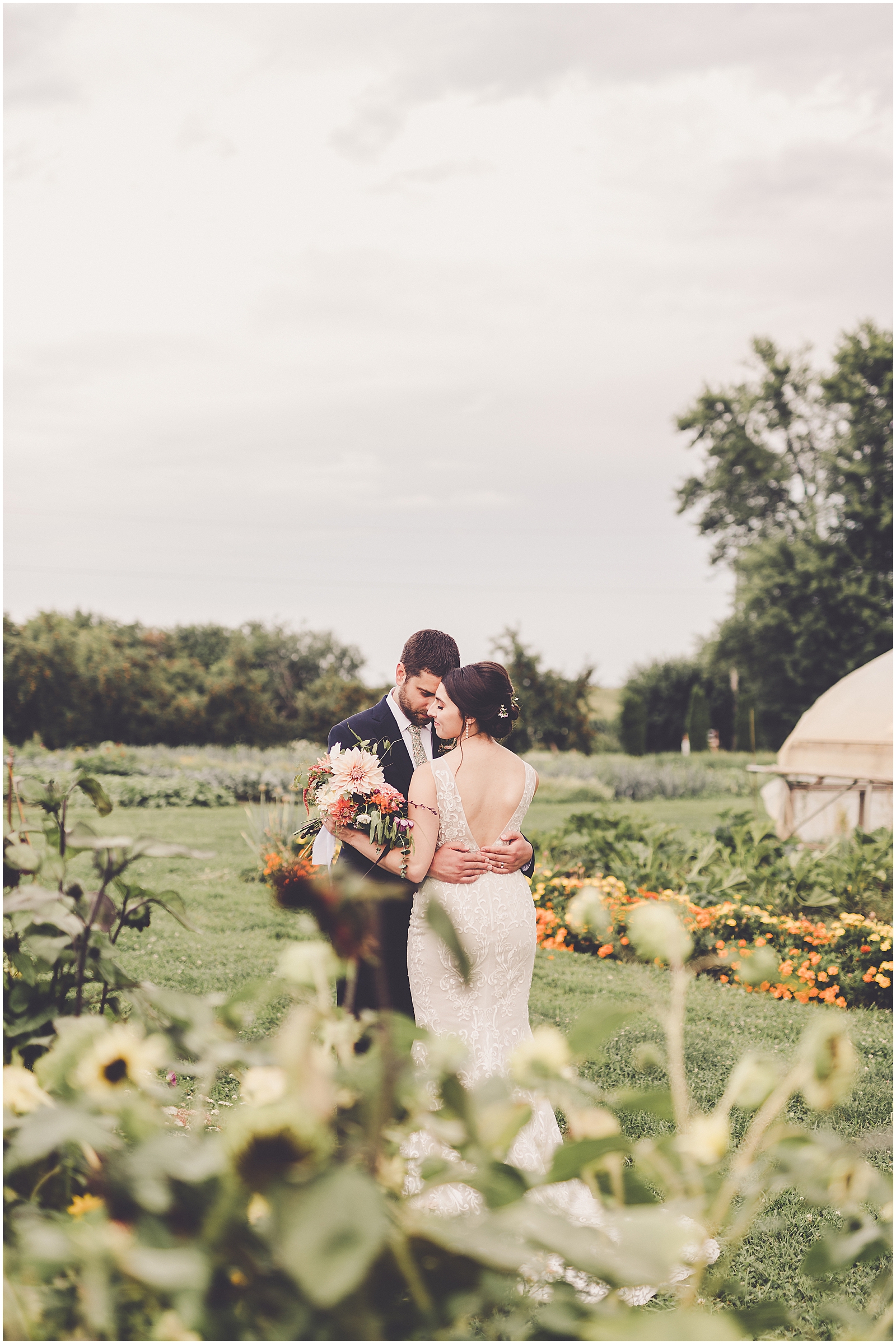 Gabby & Andrew's summer Heritage Prairie Farm wedding photos in Elburn with Chicagoland wedding photographer Kara Evans Photographer.