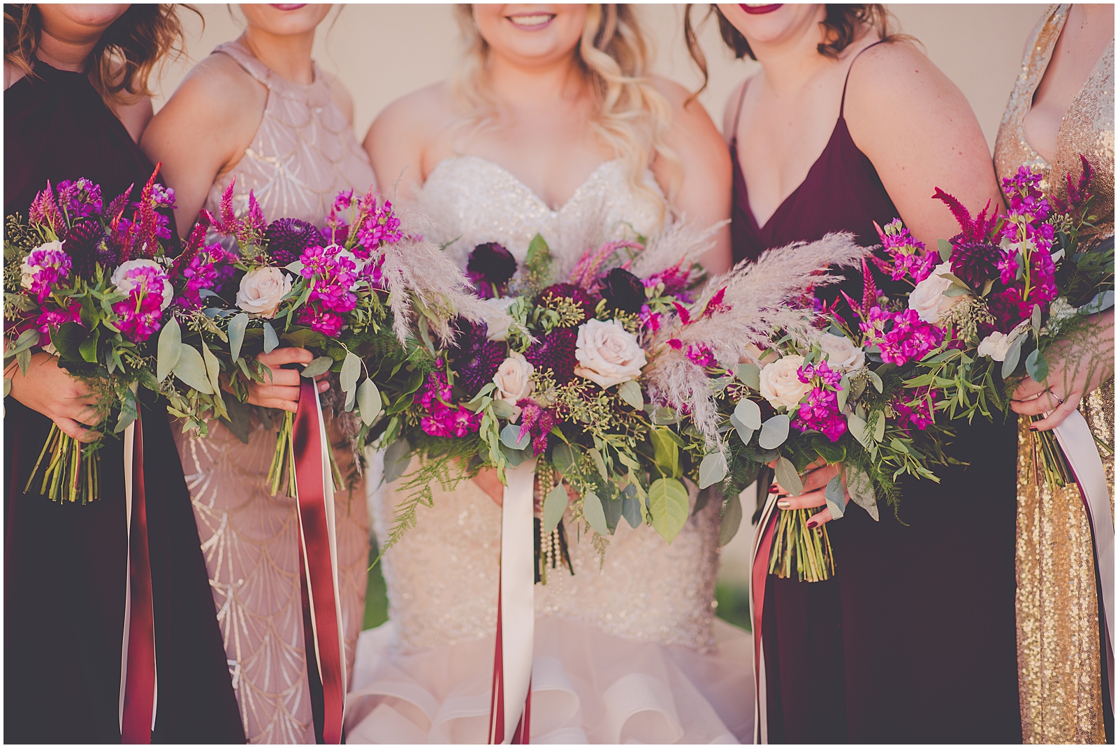 Jessica and Ashton's whimisical burgundy and dusty rose wedding feature at The Celebration Society with Chicagoland wedding photographer Kara Evans Photographer.