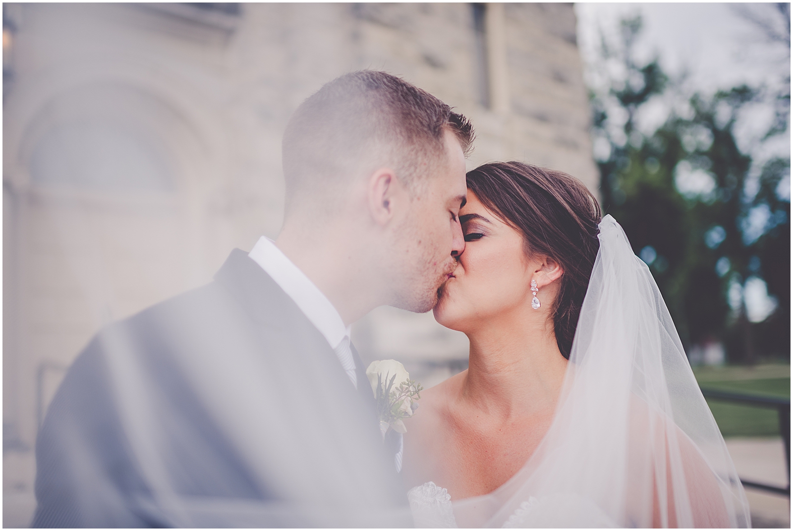 Courtney & Todd's dusty blue, greenery, and gold wedding day at St. Mary's Catholic Church in Beaverville, Illinois and Dunning Park in Iroquois, Illinois with Chicagoland wedding photographer Kara Evans Photographer.