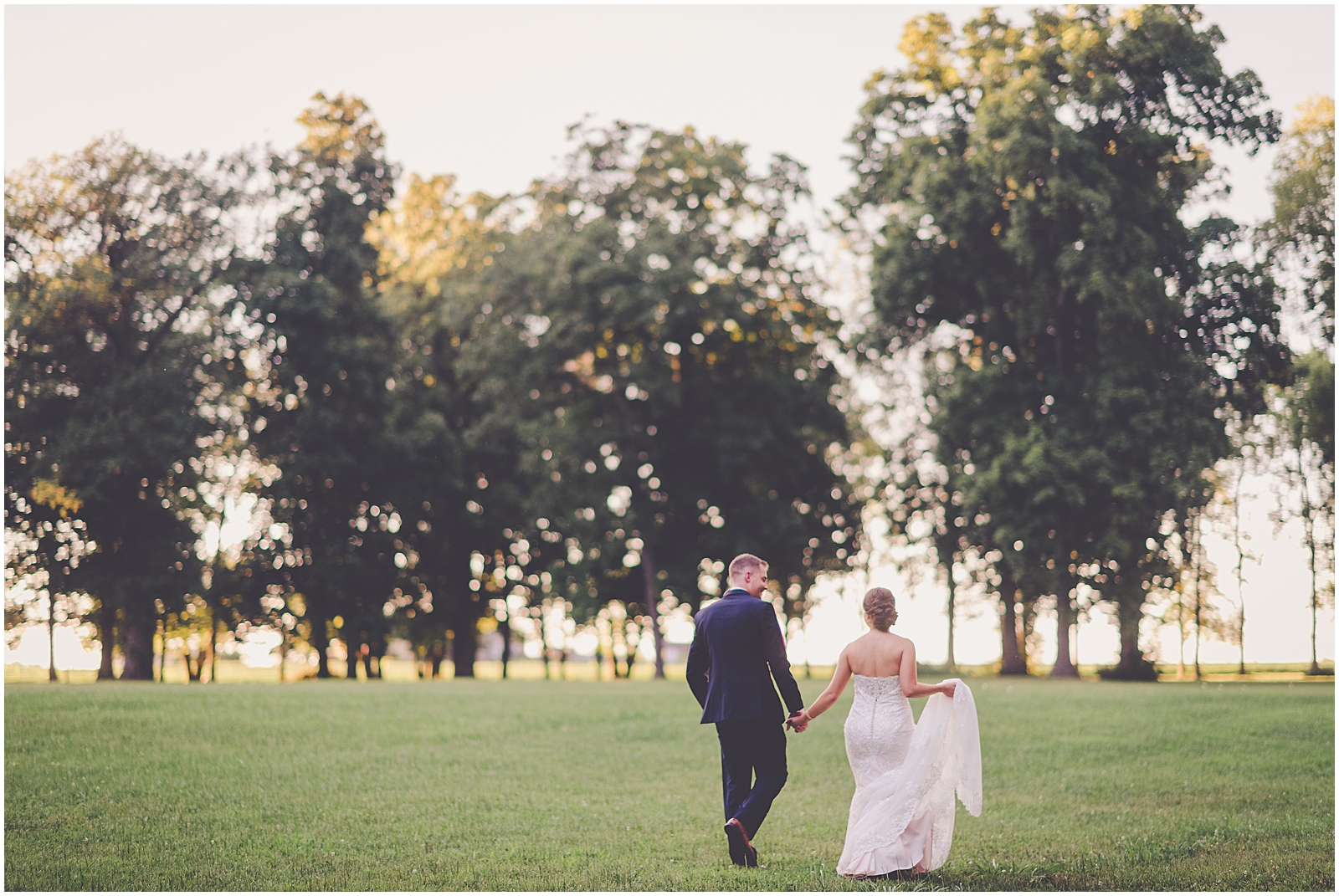 Courtney & Todd's dusty blue, greenery, and gold wedding day at St. Mary's Catholic Church in Beaverville, Illinois and Dunning Park in Iroquois, Illinois with Chicagoland wedding photographer Kara Evans Photographer.