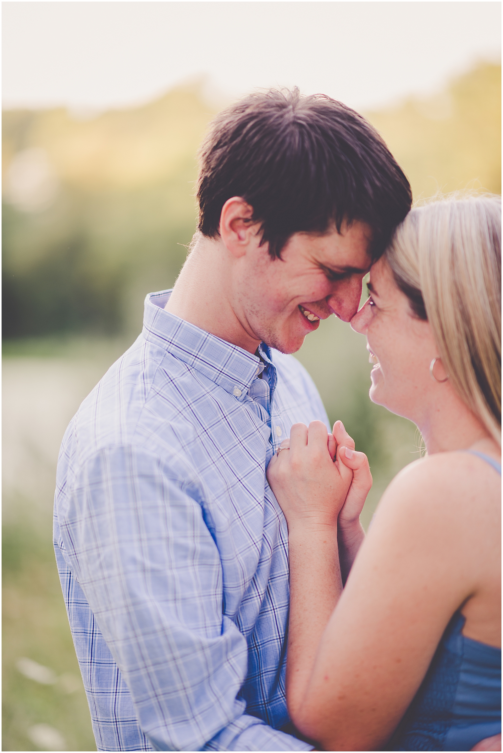 Summertime cabin engagement session in Champaign, Illinois with Chicagoland wedding photographer Kara Evans Photographer.