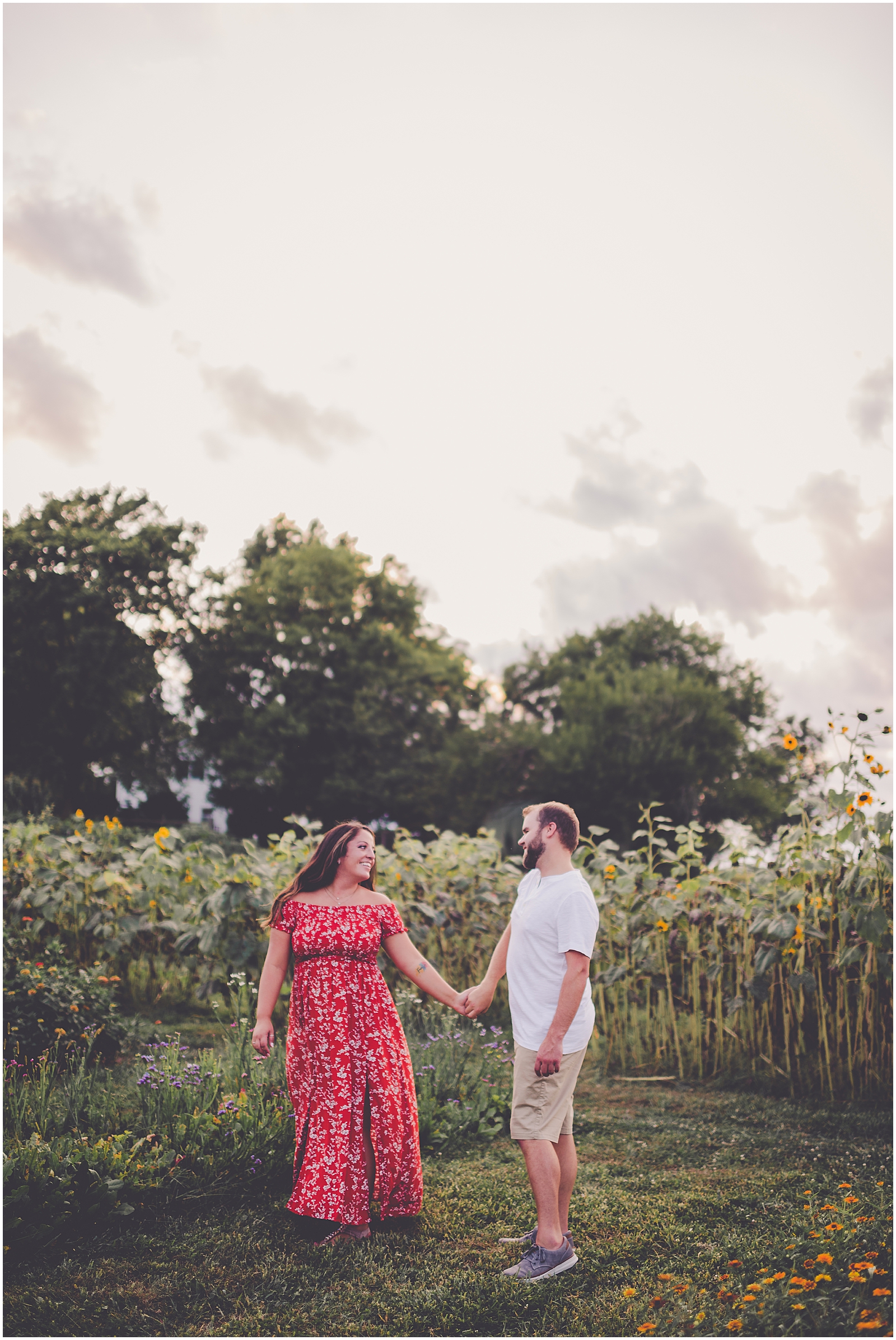 Daniela and Andrew's sunflower engagement photos at Proclamation Flowers with Chicagoland wedding photographer Kara Evans Photographer.