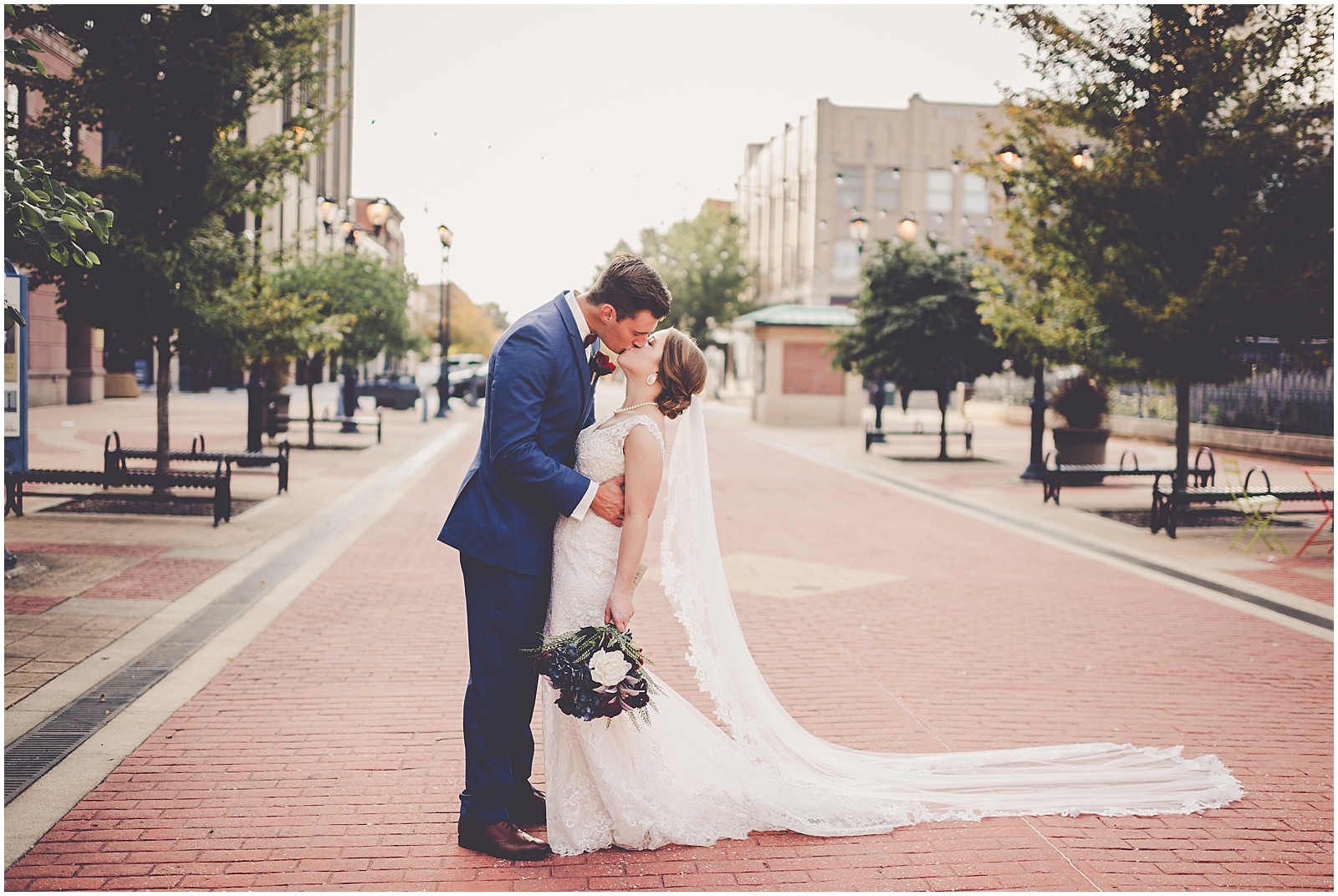 Clare and Chayce's rustic elegance fall wedding in Springfield, IL with Chicagoland wedding photographer Kara Evans Photographer.