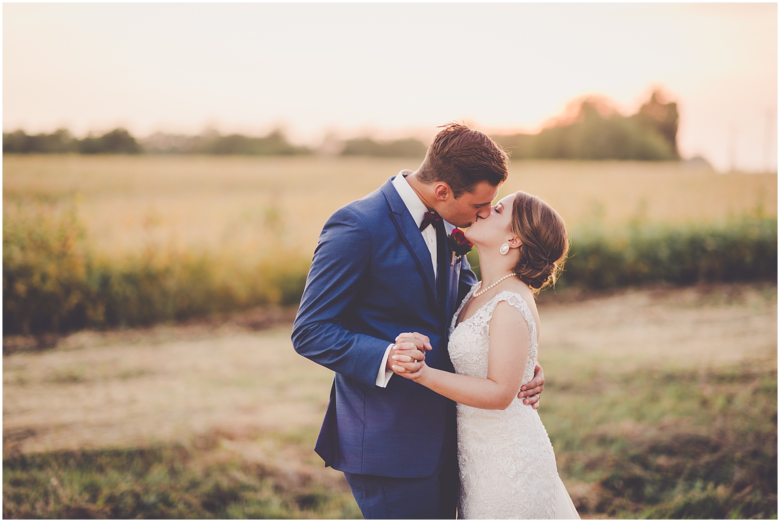 Clare and Chayce's rustic elegance fall wedding in Springfield, IL with Chicagoland wedding photographer Kara Evans Photographer.