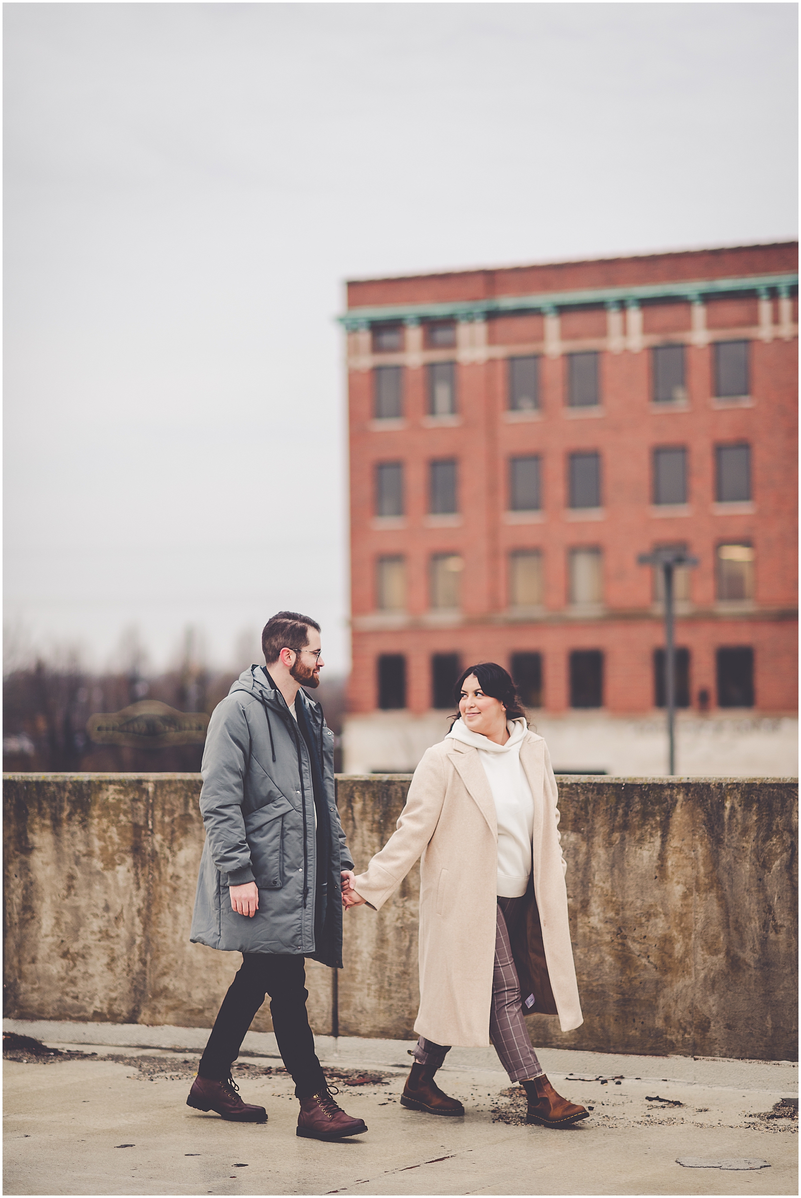 Ari and Adam's rainy downtown Kankakee anniversary session in Kankakee, IL with Chicagoland wedding photographer Kara Evans Photographer.