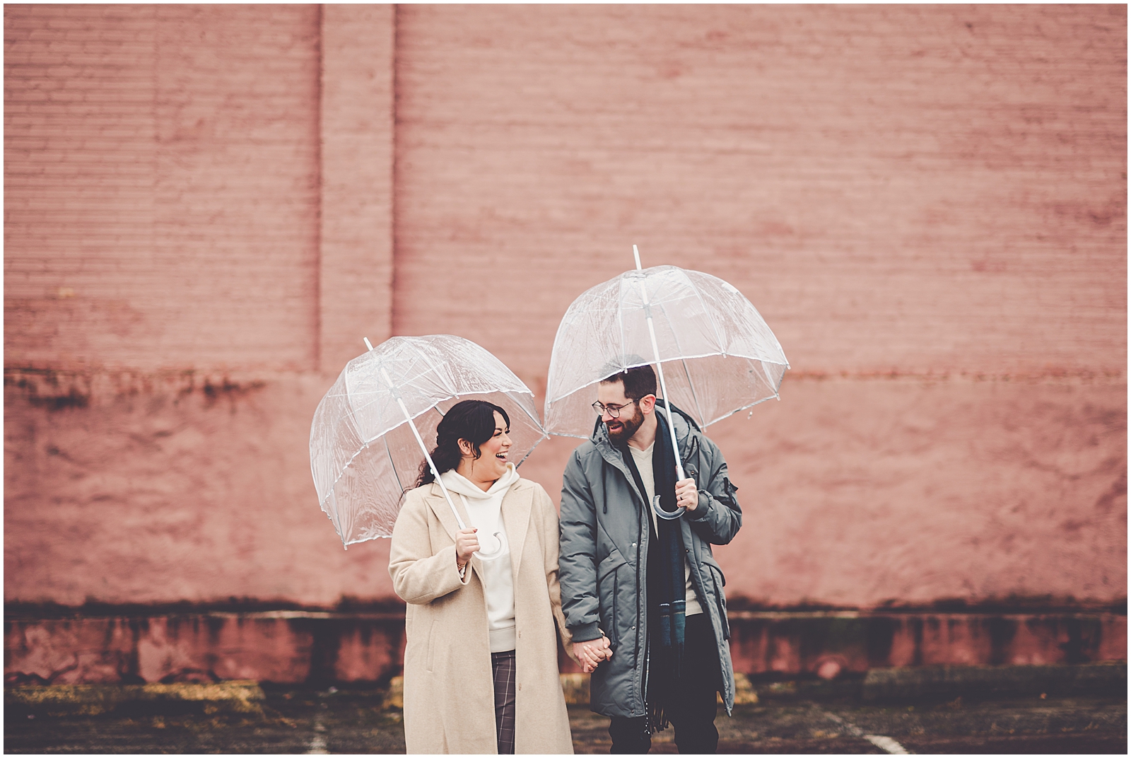 Ari and Adam's rainy downtown Kankakee anniversary session in Kankakee, IL with Chicagoland wedding photographer Kara Evans Photographer.