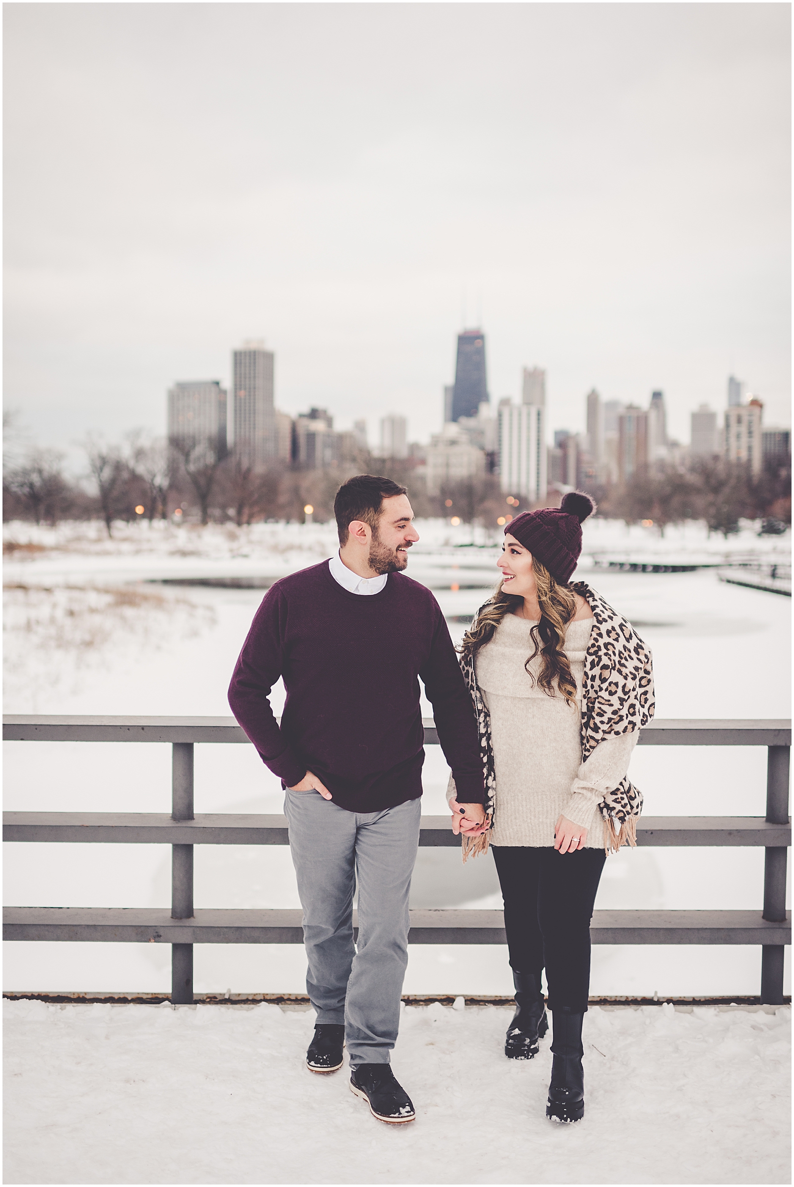Dina and Adonis' snowy winter Lincoln Park engagement photos in Chicago with Chicagoland wedding photographer Kara Evans Photographer.