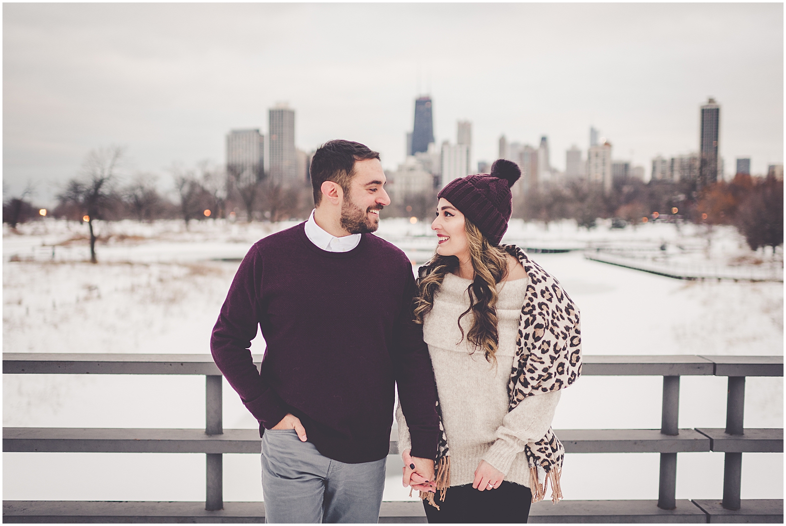 Dina and Adonis' snowy winter Lincoln Park engagement photos in Chicago with Chicagoland wedding photographer Kara Evans Photographer.