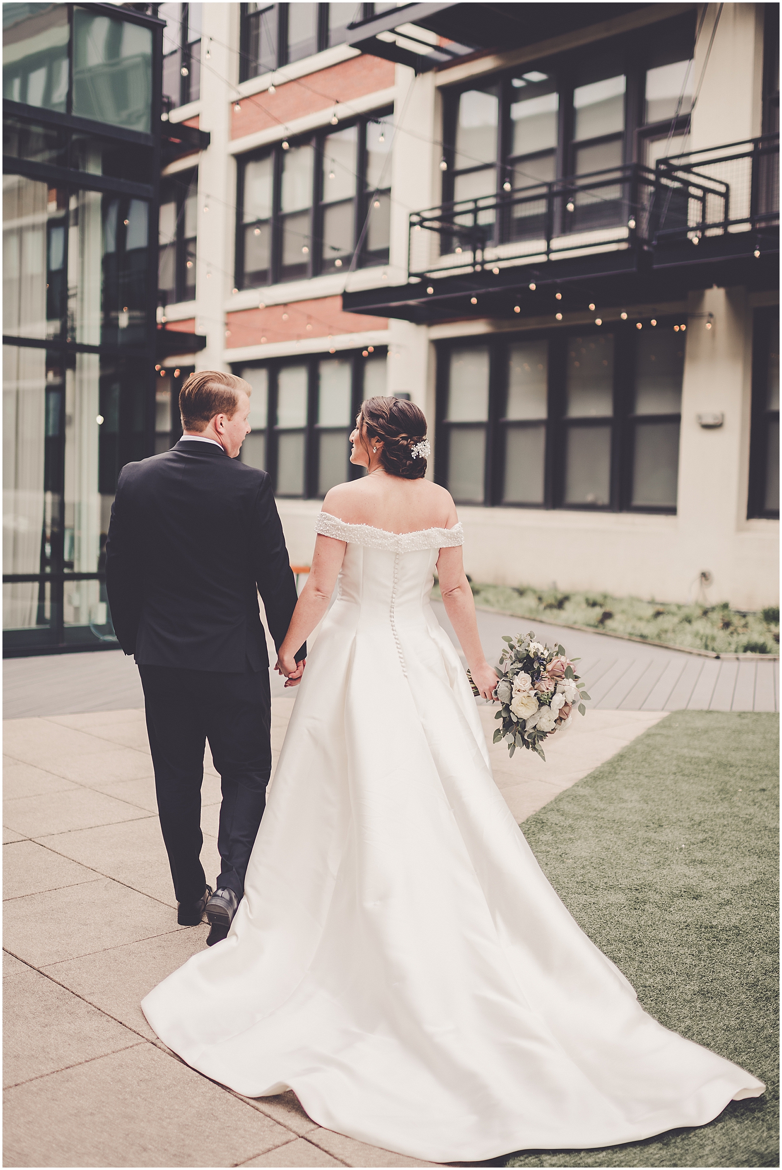 Kim and Josh's elegant spring Greenhouse Loft wedding in Chicago, Illinois with Chicagoland wedding photographer Kara Evans Photographer.