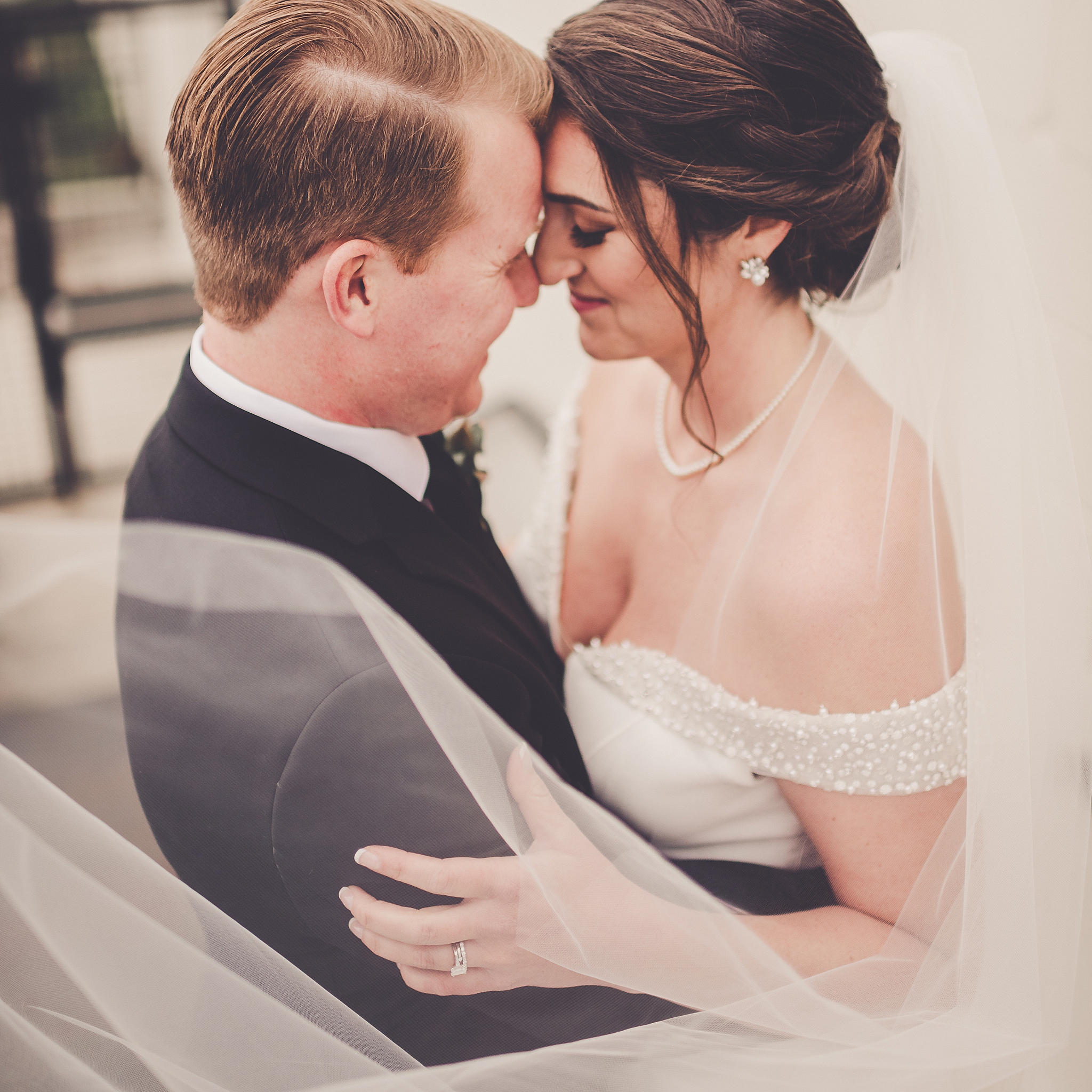 Kim and Josh's elegant spring Greenhouse Loft wedding in Chicago, Illinois with Chicagoland wedding photographer Kara Evans Photographer.