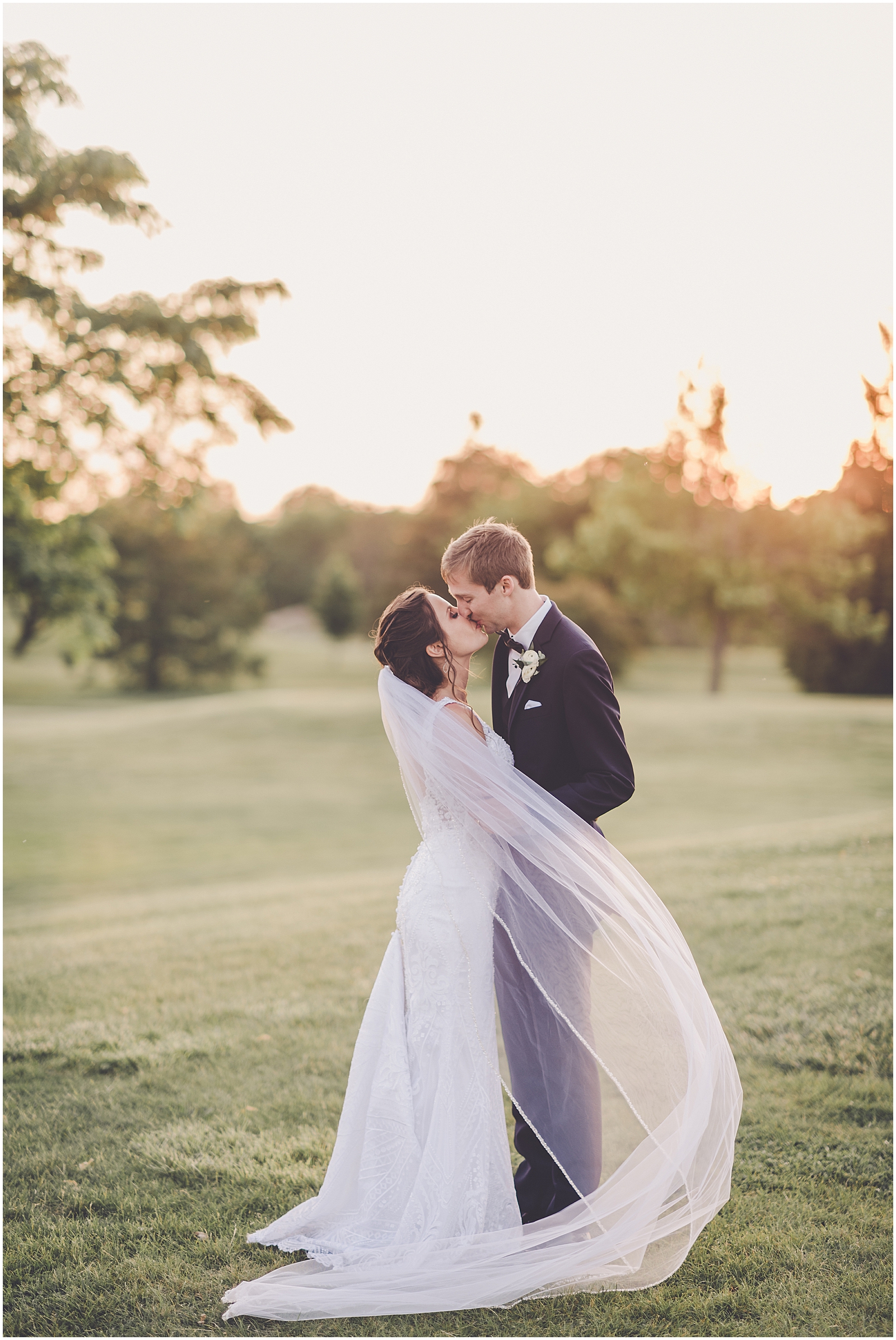 Marybeth and Ryan's dusty blue & greenery wedding at The Odyssey in Tinley Park with Chicago wedding photographer Kara Evans Photographer.