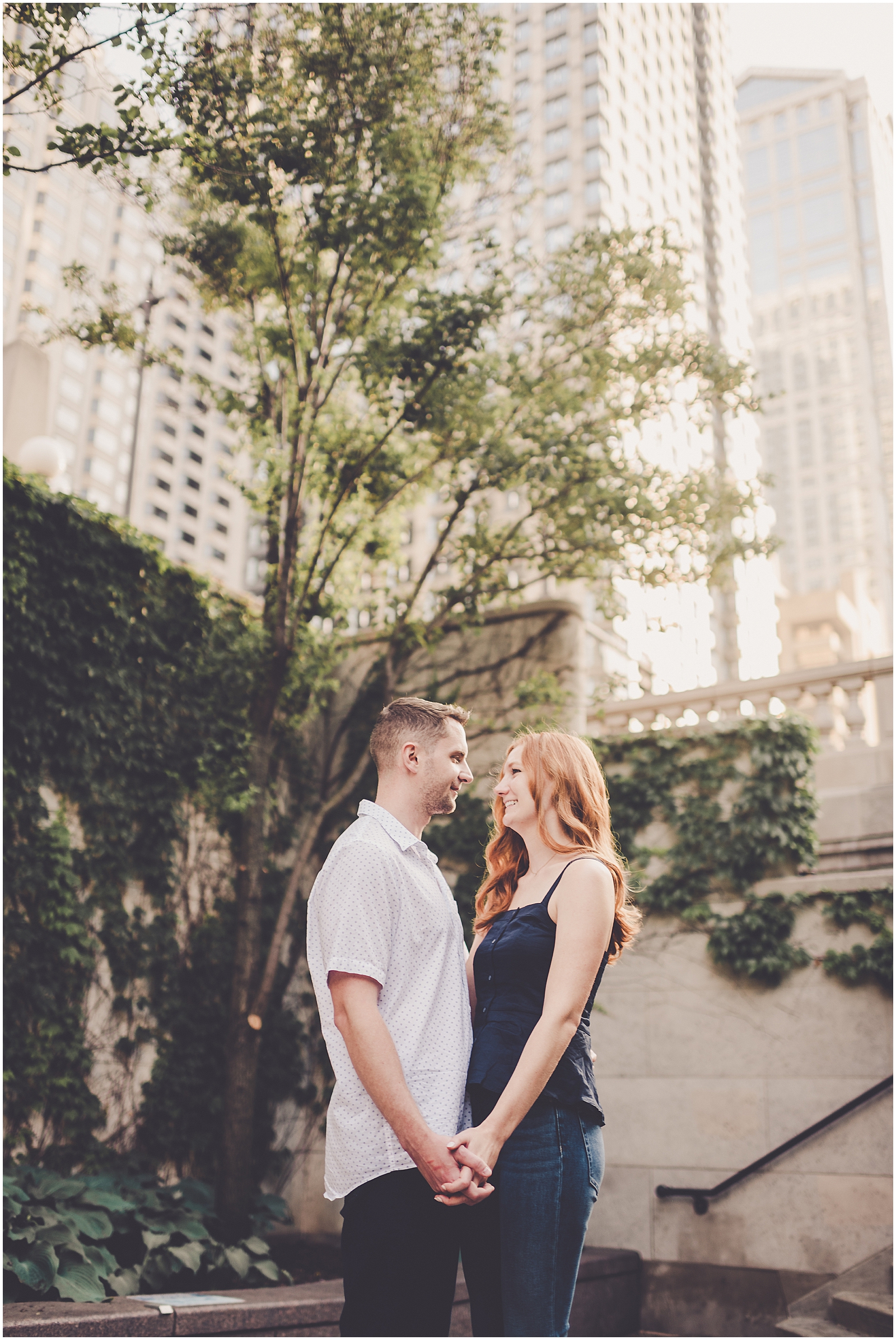 Stephanie and Dan's summer riverwalk & skyline engagement photos in Chicago with Chicagoland wedding photographer Kara Evans Photographer.