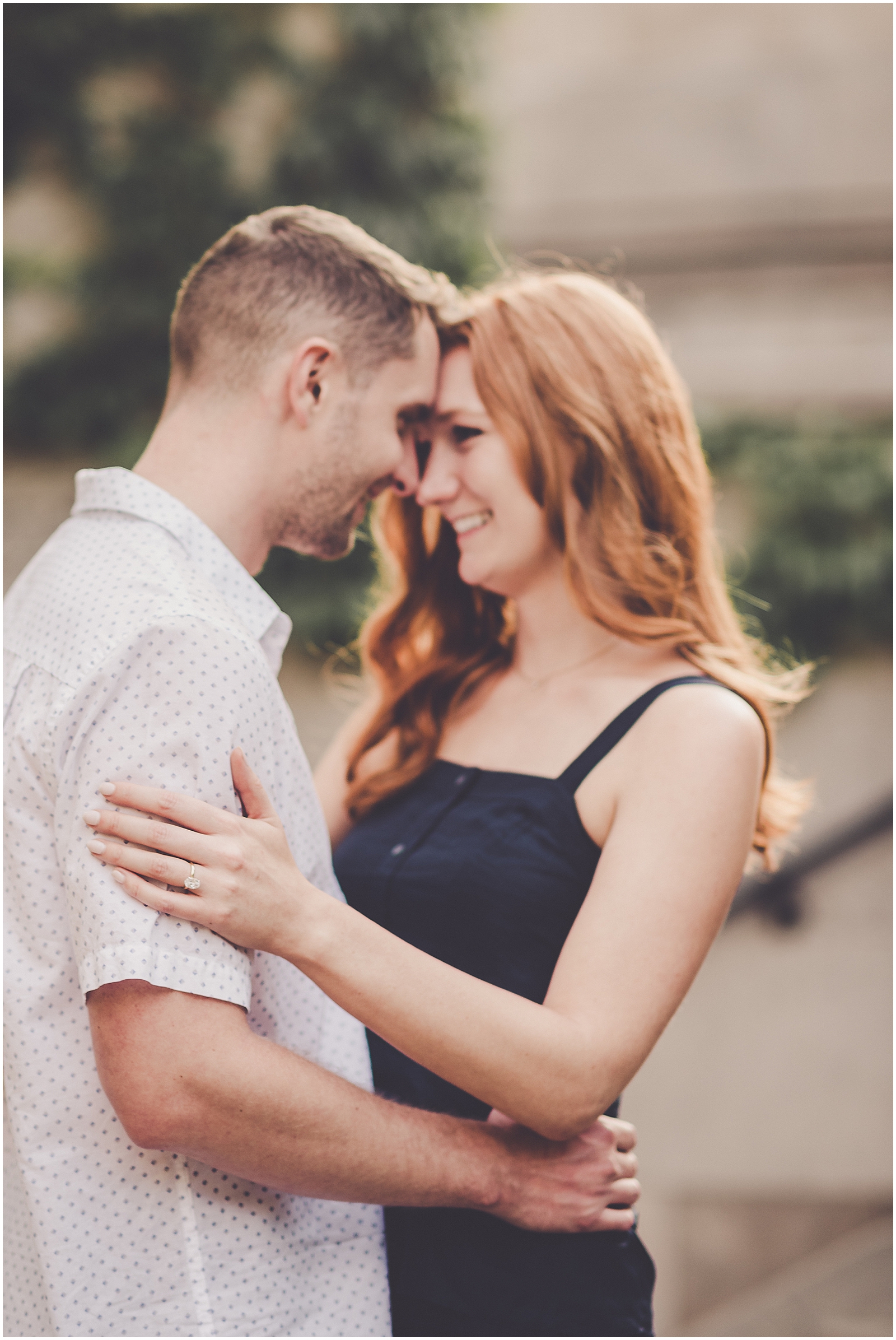 Stephanie and Dan's summer riverwalk & skyline engagement photos in Chicago with Chicagoland wedding photographer Kara Evans Photographer.