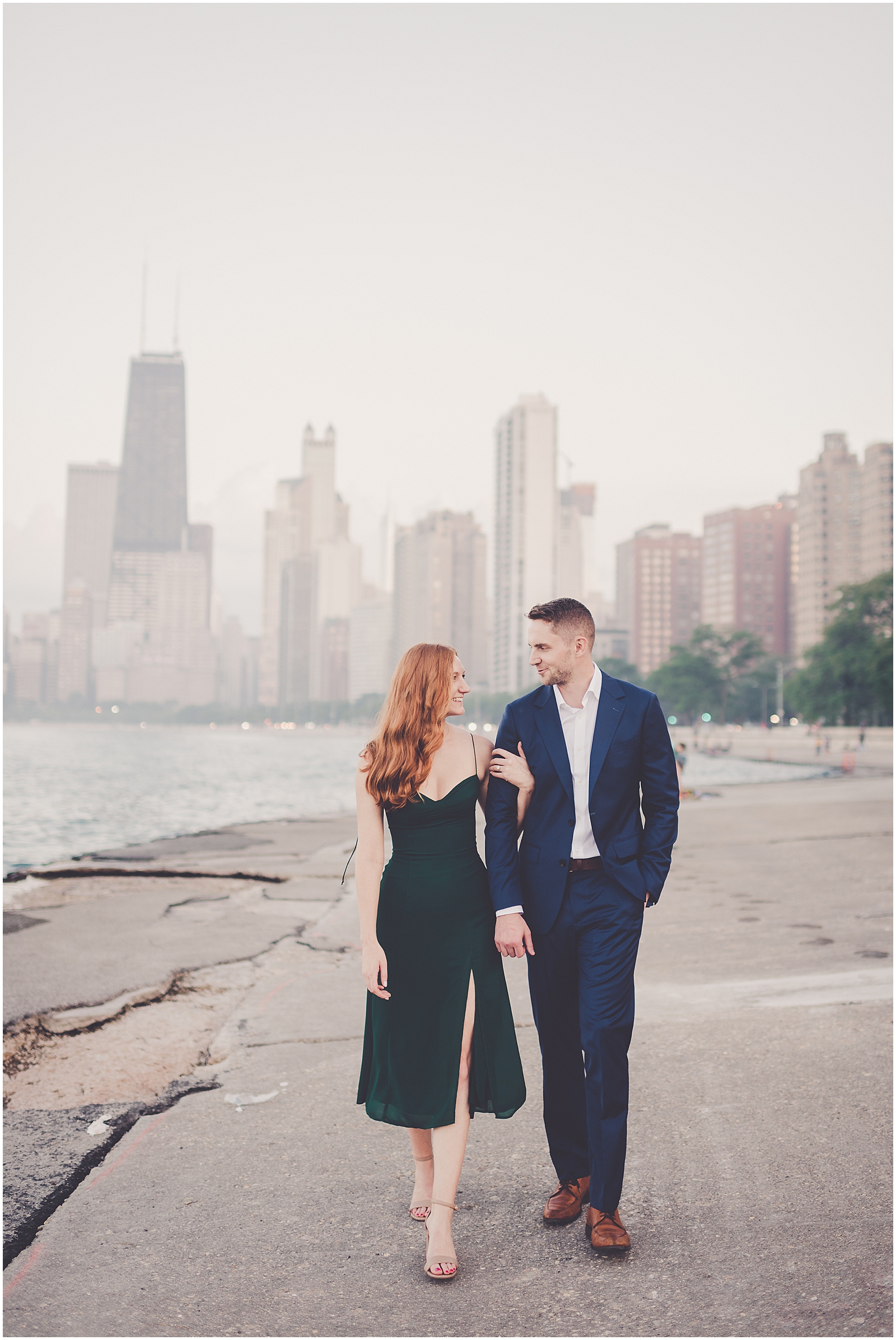 Stephanie and Dan's summer riverwalk & skyline engagement photos in Chicago with Chicagoland wedding photographer Kara Evans Photographer.