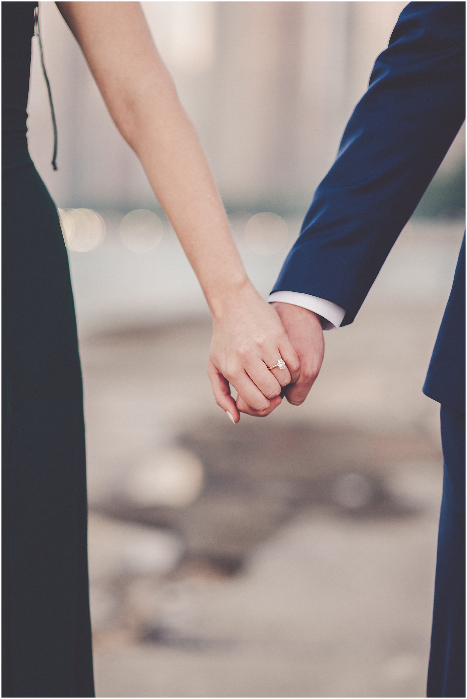 Stephanie and Dan's summer riverwalk & skyline engagement photos in Chicago with Chicagoland wedding photographer Kara Evans Photographer.