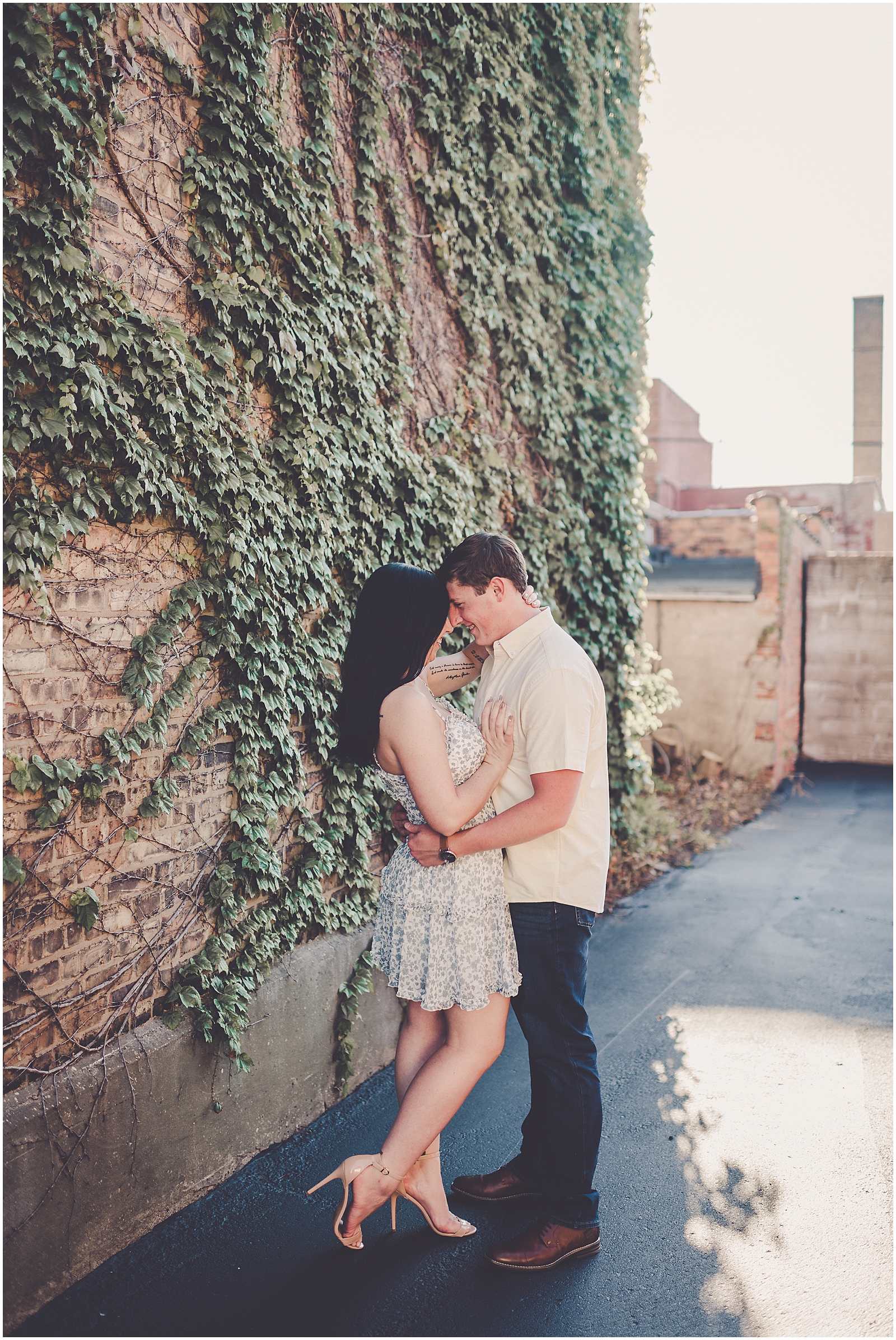 Kylie and Noah's Silver Beach engagement photos in St. Joseph, Michigan with Chicagoland wedding photographer Kara Evans Photographer.