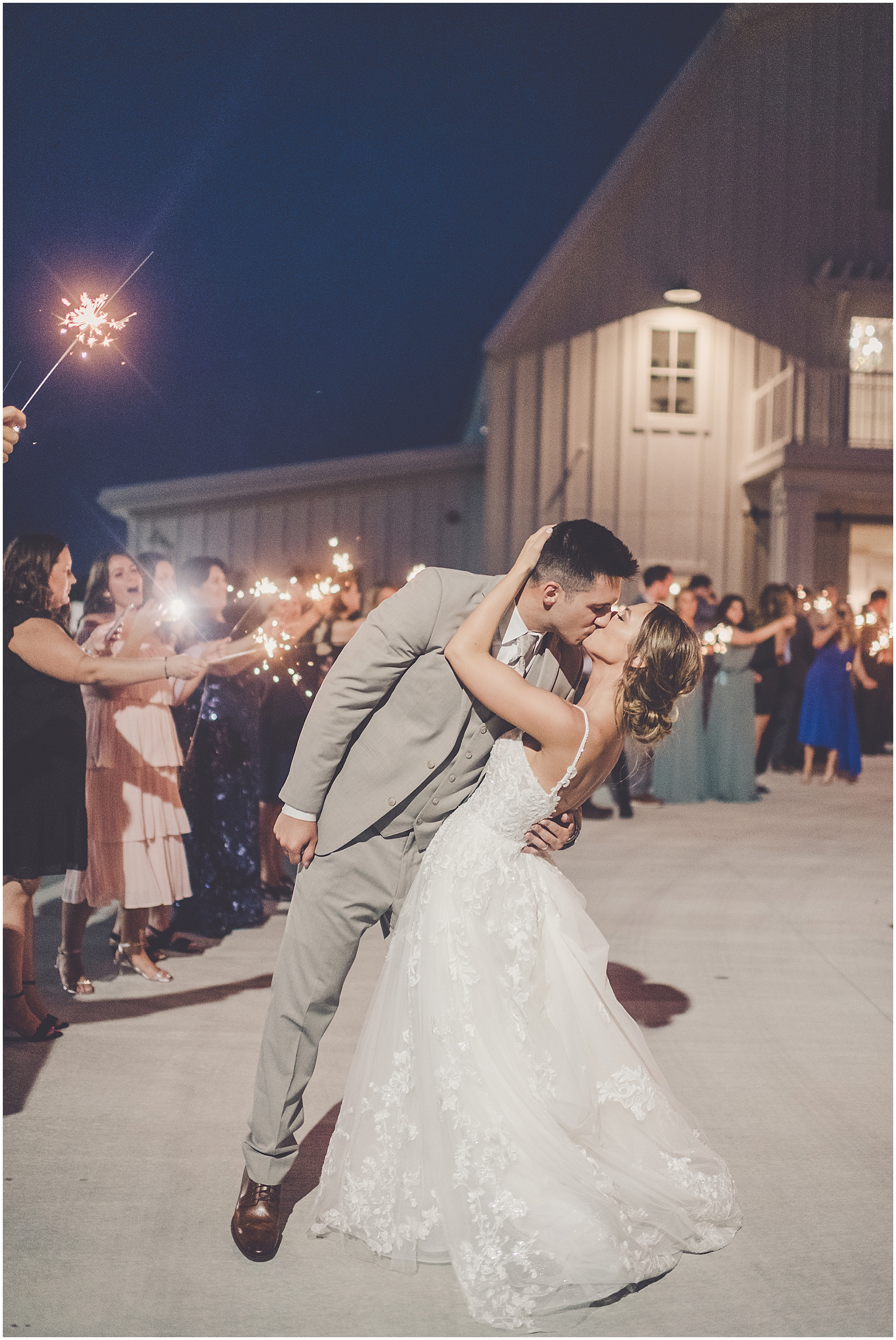 Emily and Milan's romantic summer wedding at Providence Vineyard in Hebron, IL with Chicagoland wedding Photographer Kara Evans Photographer.