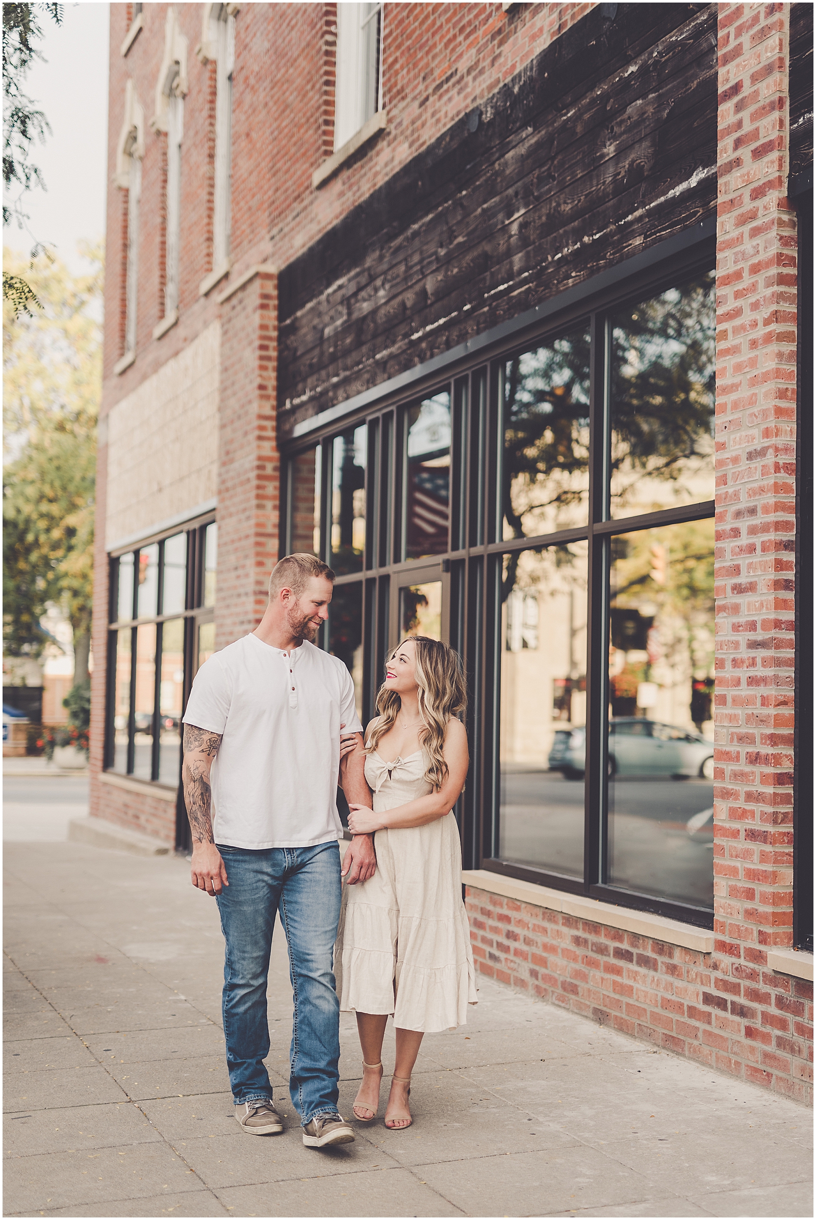 Bre and Sean's fall downtown Crown Point engagement in Crown Point, IN with Chicagoland wedding photographer Kara Evans Photographer.