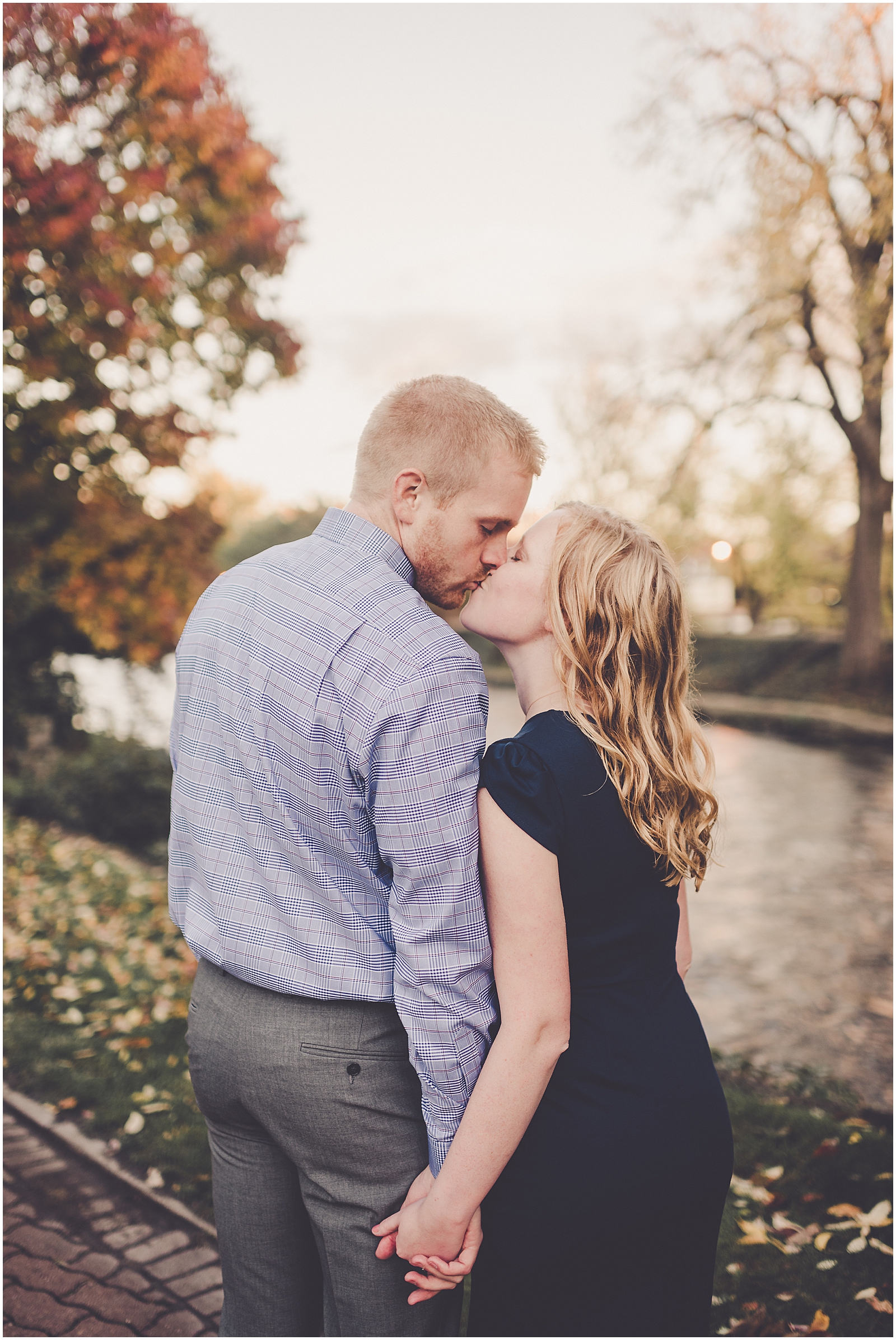 Kayla & Brandon's fall Naperville Riverwalk engagement session in Naperville with Chicagoland wedding photographer Kara Evans Photographer.