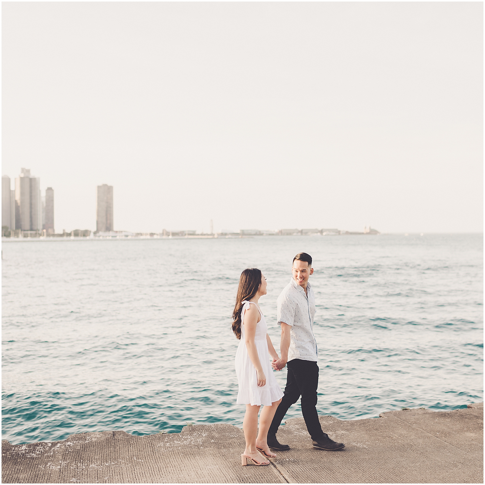 Diana & Osmund's spring Museum Campus engagement photos in Chicago with Chicagoland wedding photographer Kara Evans Photographer.