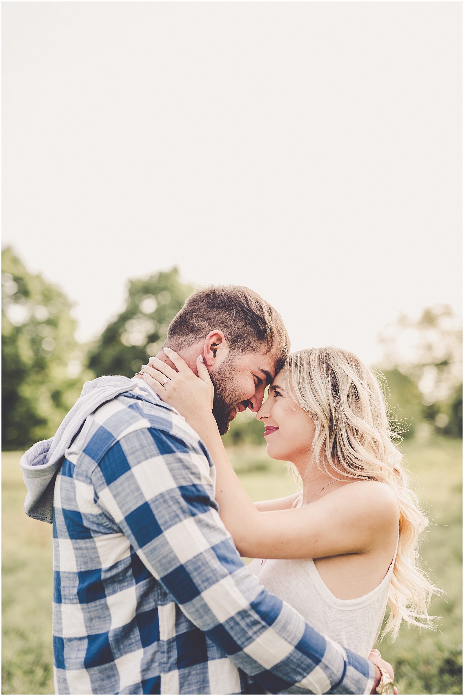 Makenzie and Ashton's spring engagement photos in Kankakee, Illinois with Chicagoland wedding photographer Kara Evans Photographer.