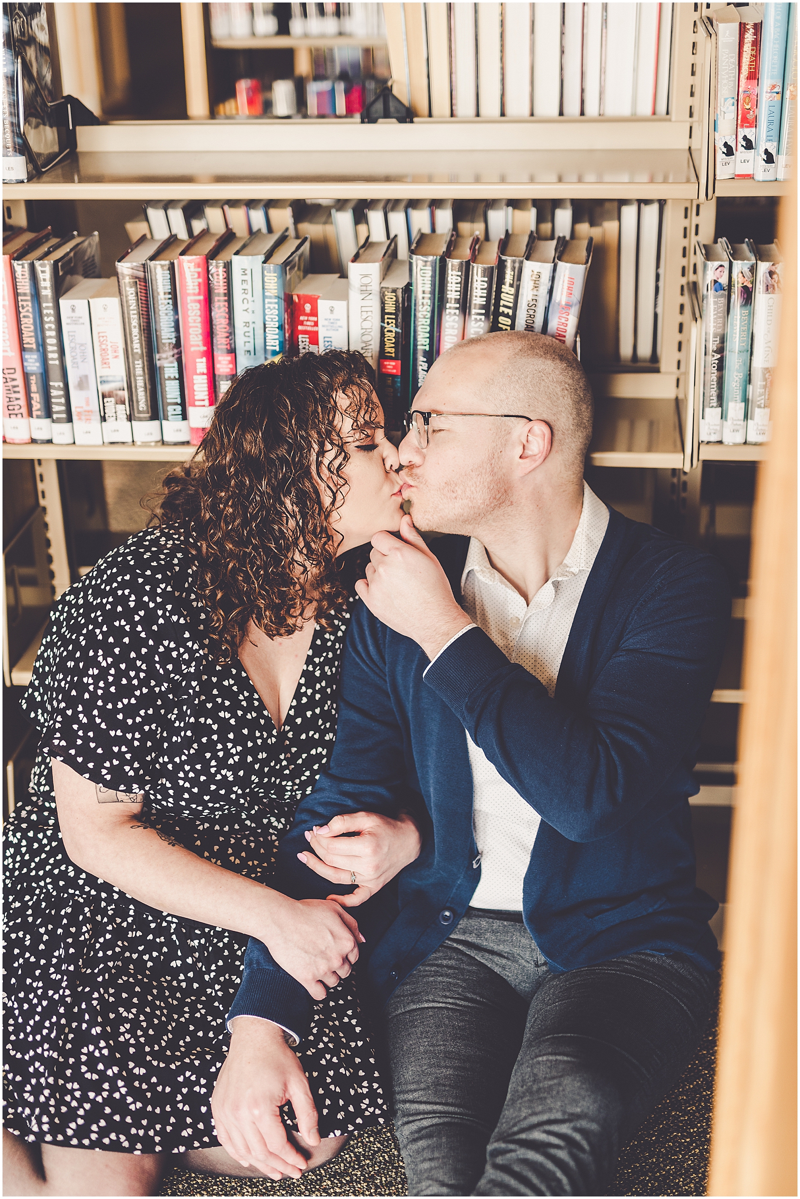 Lizzie & Jake's library engagement session in New Lenox, Illinois with Chicagoland wedding photographer Kara Evans Photographer.