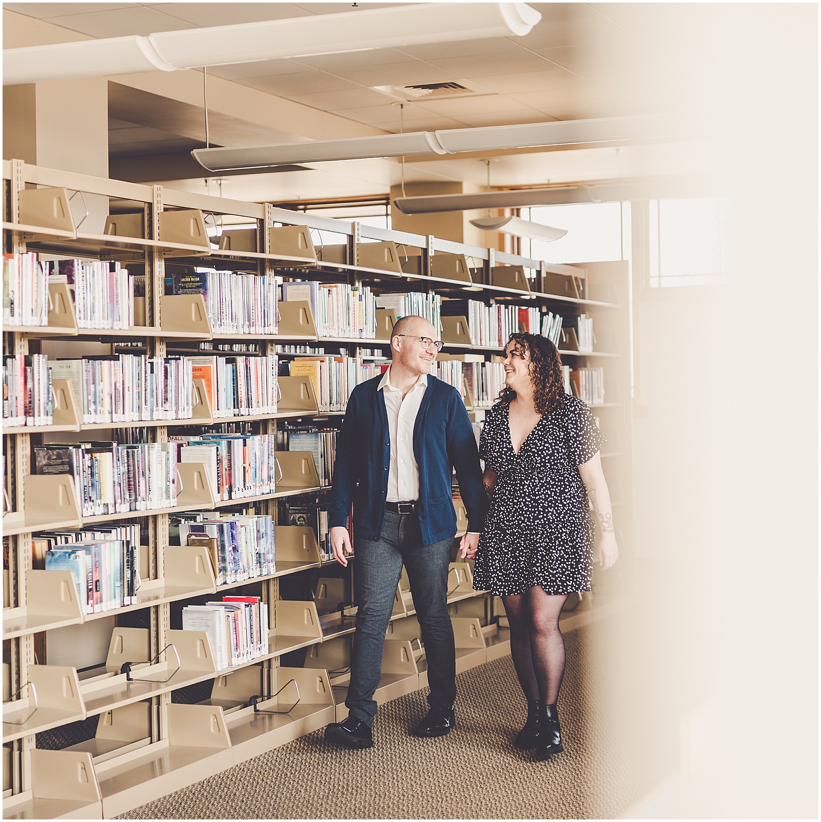 Lizzie & Jake's library engagement session in New Lenox, Illinois with Chicagoland wedding photographer Kara Evans Photographer.