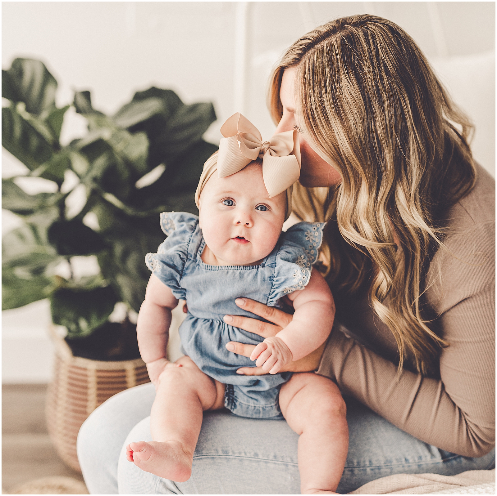 Six-month milestone session with the Carmien family at Kara Evans Photographer - Natural Light Studio Photographer in Kankakee, Illinois.