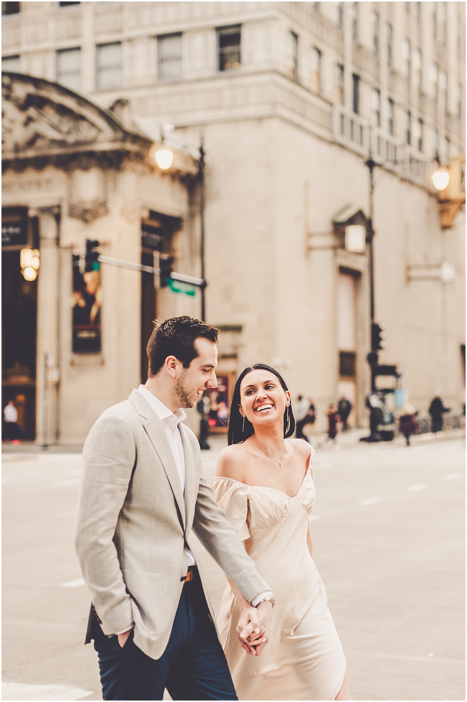 Delaney and Corey's Lyric Opera & Chicago River bridge engagement photos in Chicago with Chicagoland wedding photographer Kara Evans Photographer.