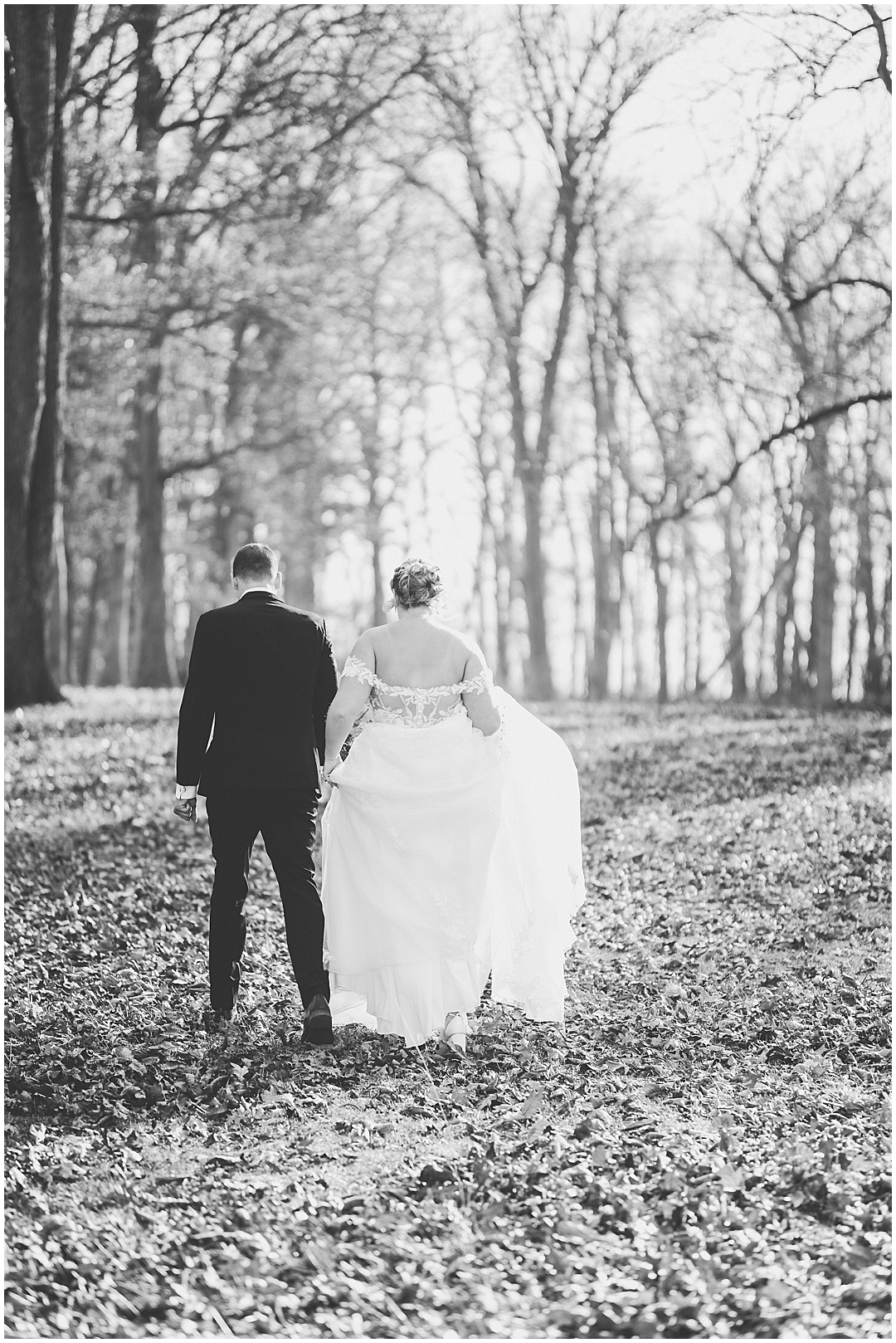 Alaina and Konnor's winter I Hotel wedding day in Champaign, Illinois with Chicagoland wedding photographer Kara Evans Photographer.