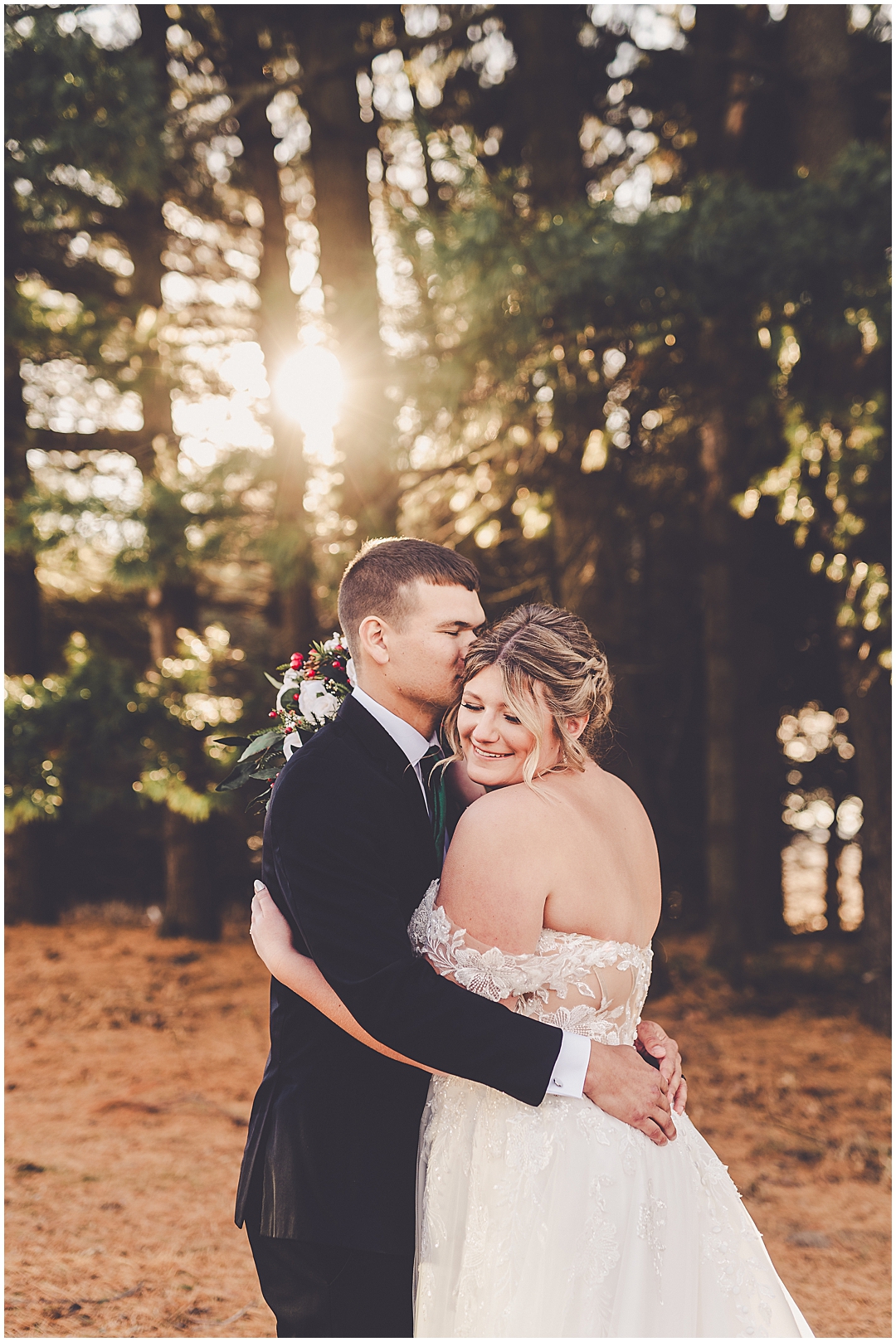 Alaina and Konnor's winter I Hotel wedding day in Champaign, Illinois with Chicagoland wedding photographer Kara Evans Photographer.