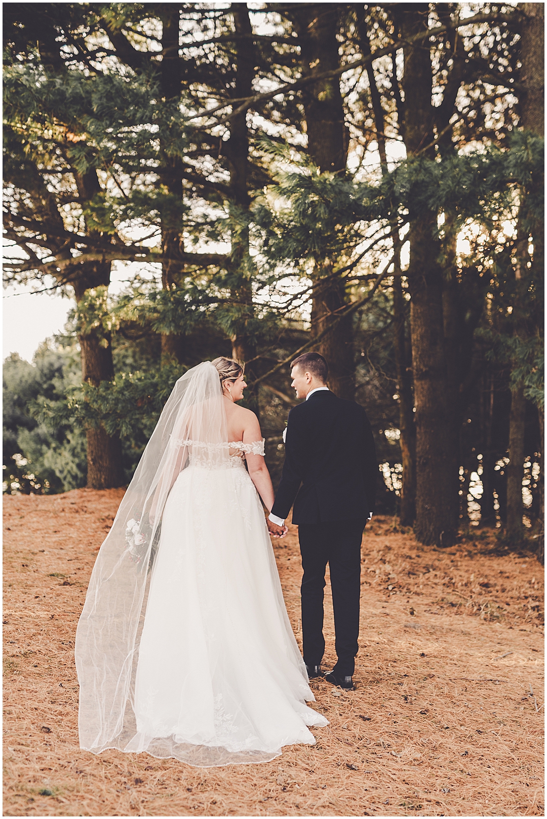 Alaina and Konnor's winter I Hotel wedding day in Champaign, Illinois with Chicagoland wedding photographer Kara Evans Photographer.