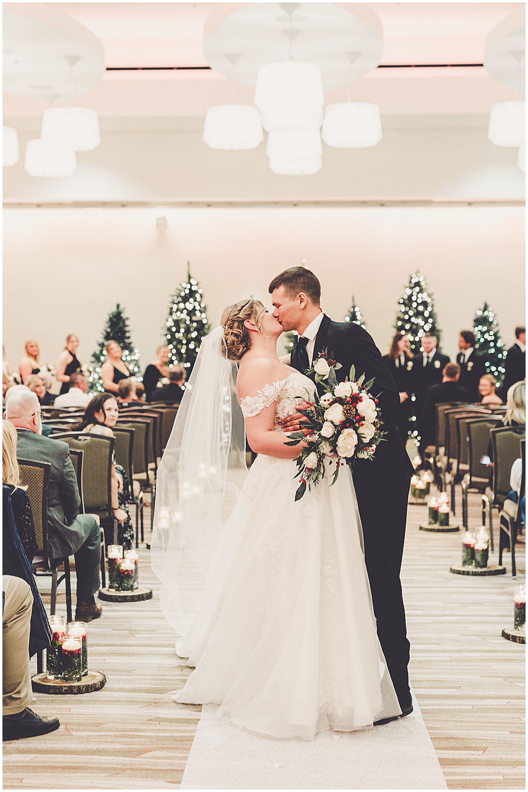 Alaina and Konnor's winter I Hotel wedding day in Champaign, Illinois with Chicagoland wedding photographer Kara Evans Photographer.