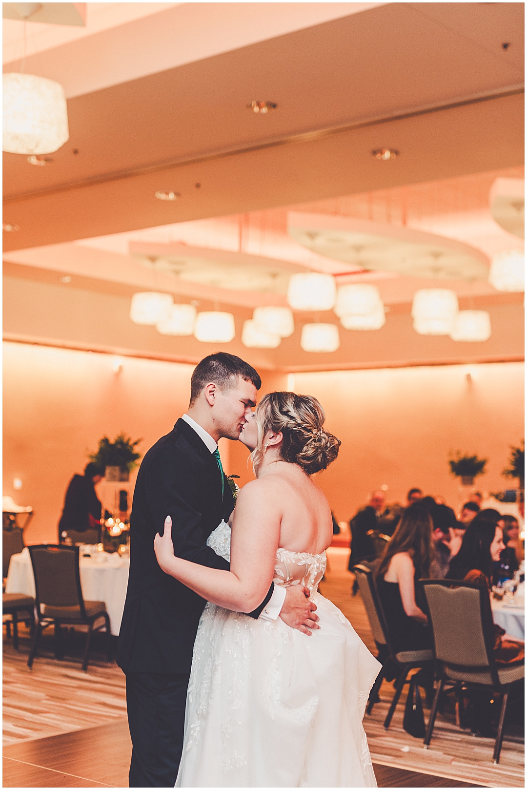 Alaina and Konnor's winter I Hotel wedding day in Champaign, Illinois with Chicagoland wedding photographer Kara Evans Photographer.