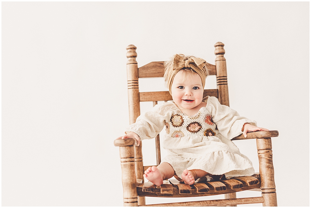 Studio one year milestone photos in downtown Kankakee with Kankakee family photographer Kara Evans Photographer.