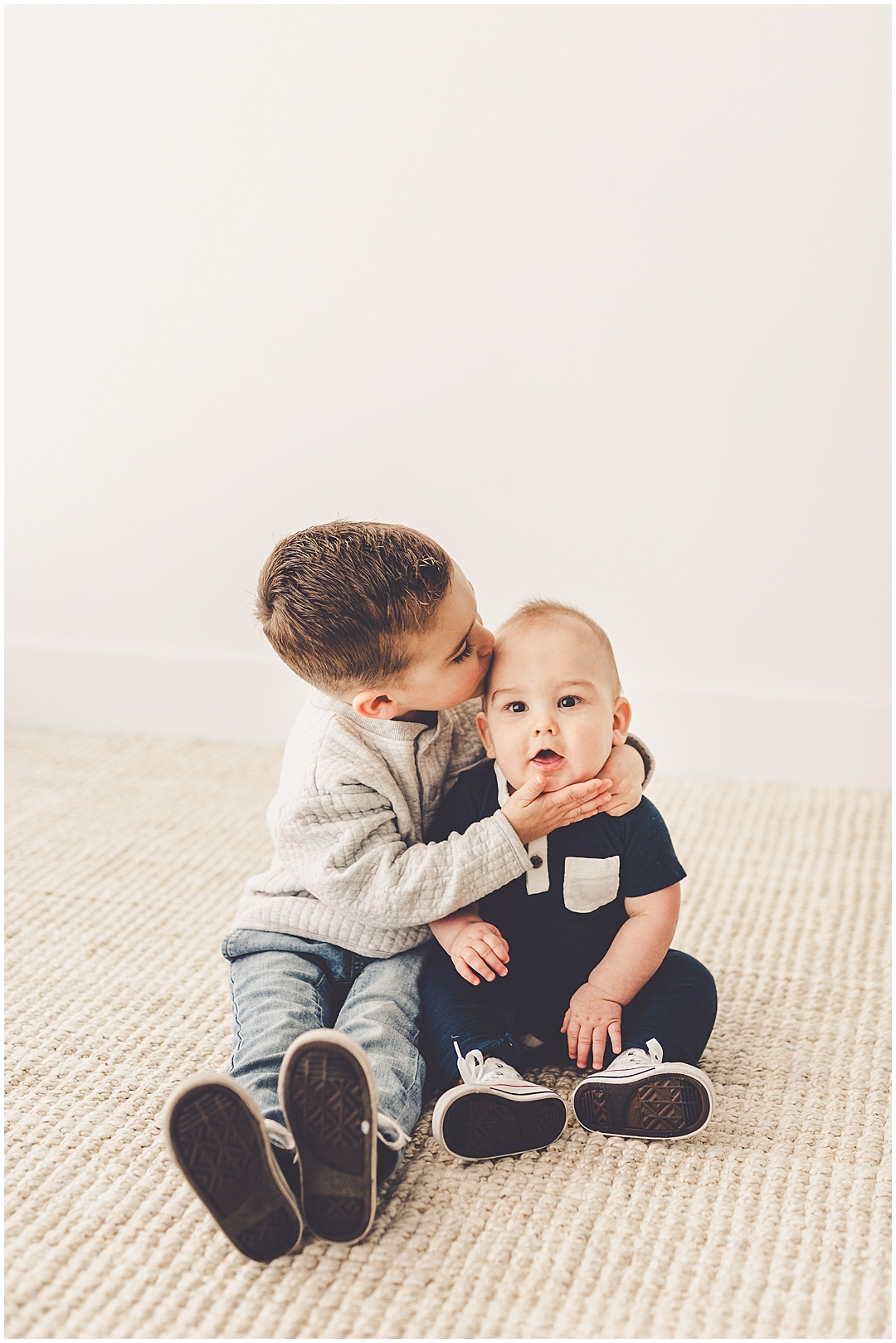 Kankakee studio family and six-month milestone photos with Kankakee family photographer Kara Evans Photographer.