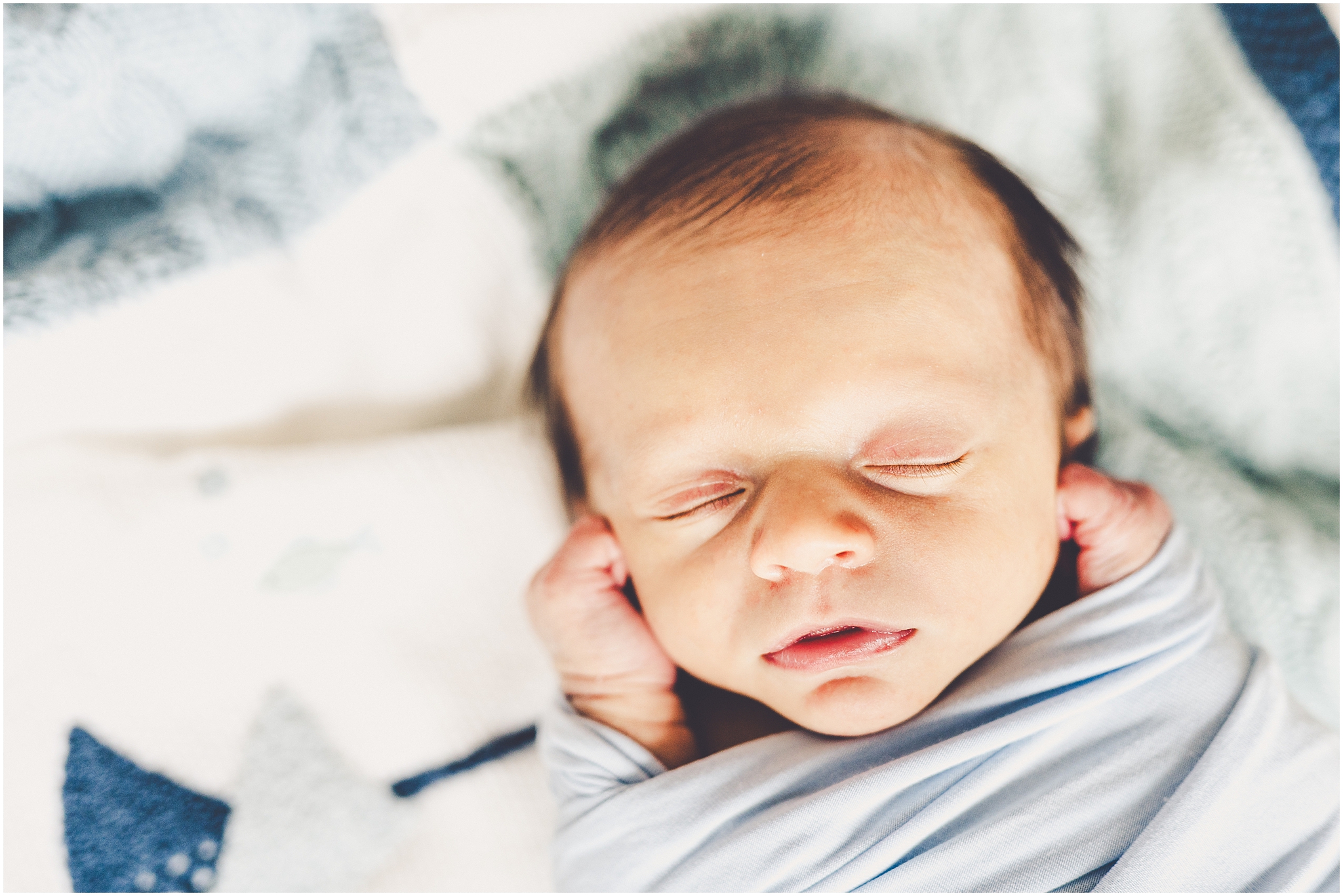 Lifestyle newborn photos in Chicago, Illinois with Kankakee County family and newborn photographer Kara Evans Photographer.