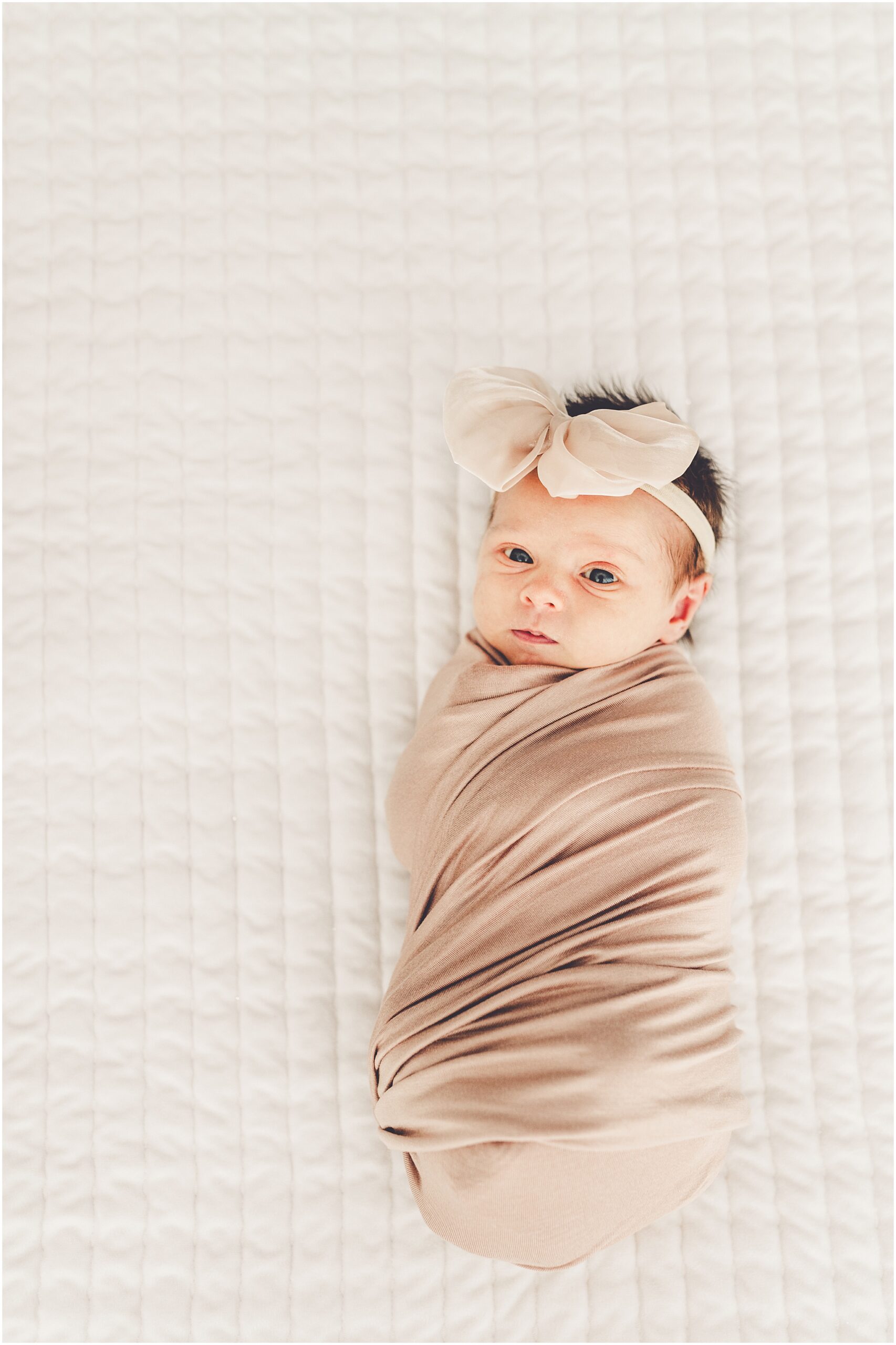 Kara Evans is a Kankakee Newborn Photographer. The studio is located in Kankakee and is the perfect location for photos with your newest little one!