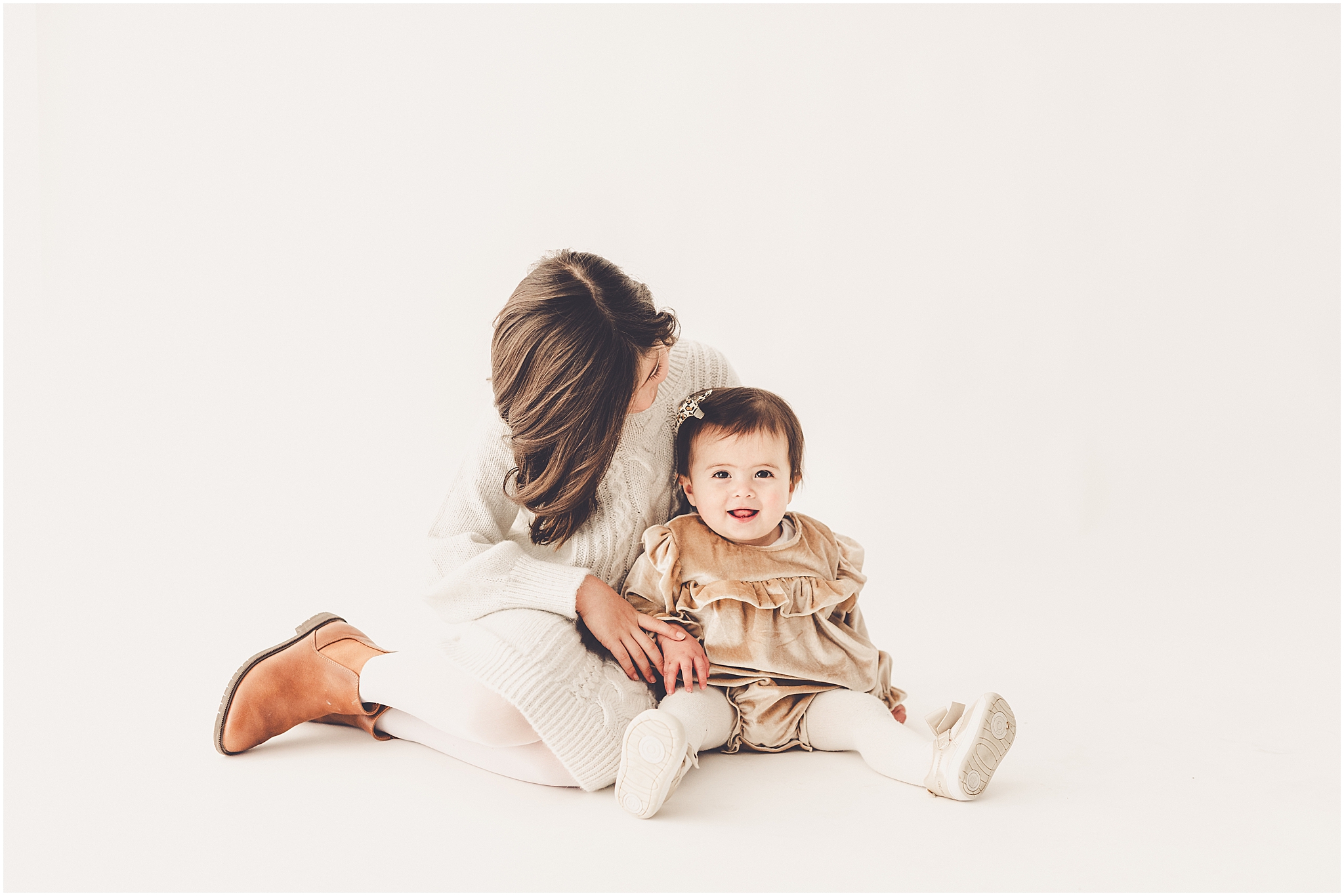 A one-year milestone session at Studio 388 in Kankakee, Illinois with Kankakee family photographer Kara Evans Photographer.