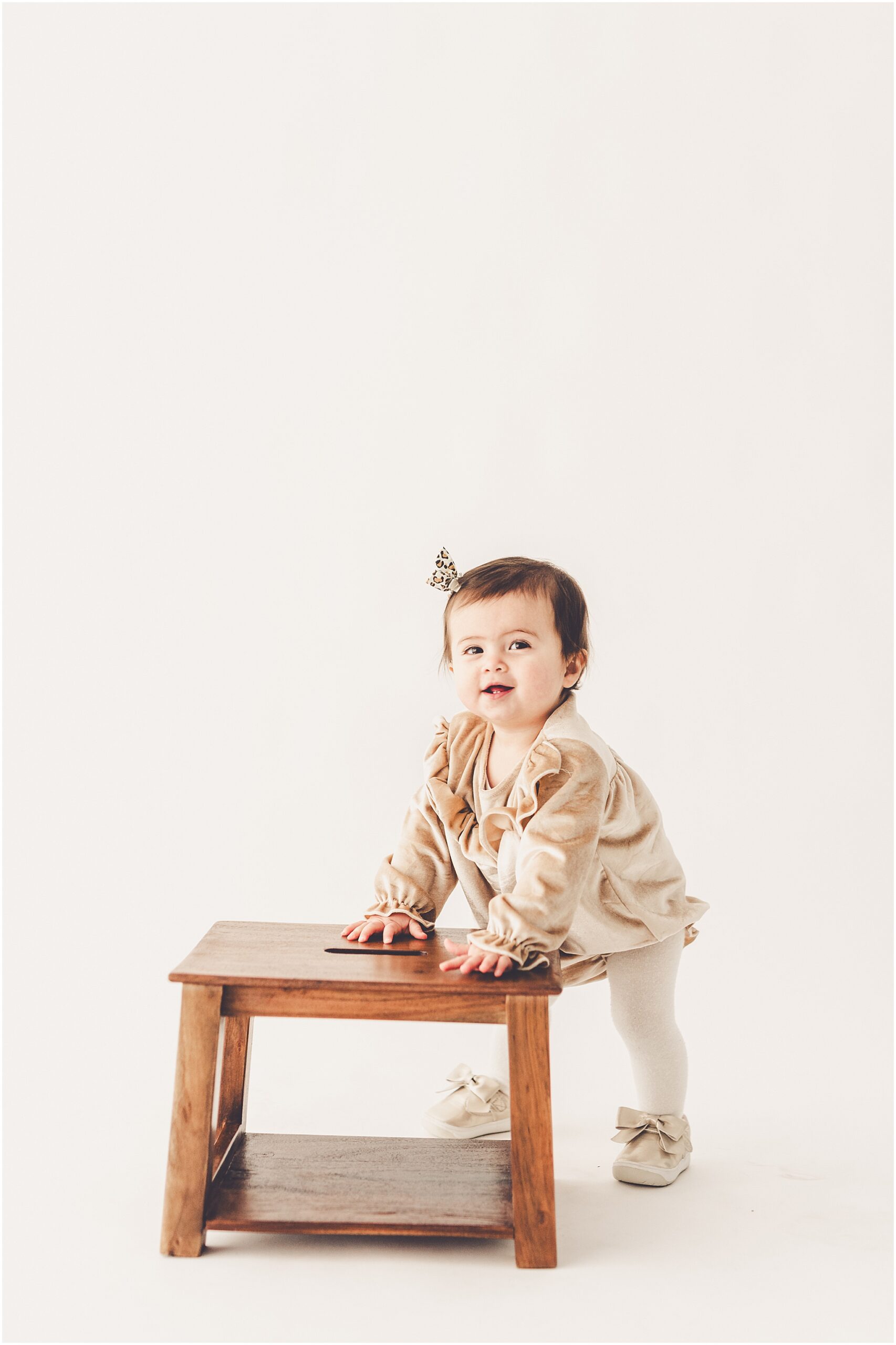 A one-year milestone session at Studio 388 in Kankakee, Illinois with Kankakee family photographer Kara Evans Photographer.