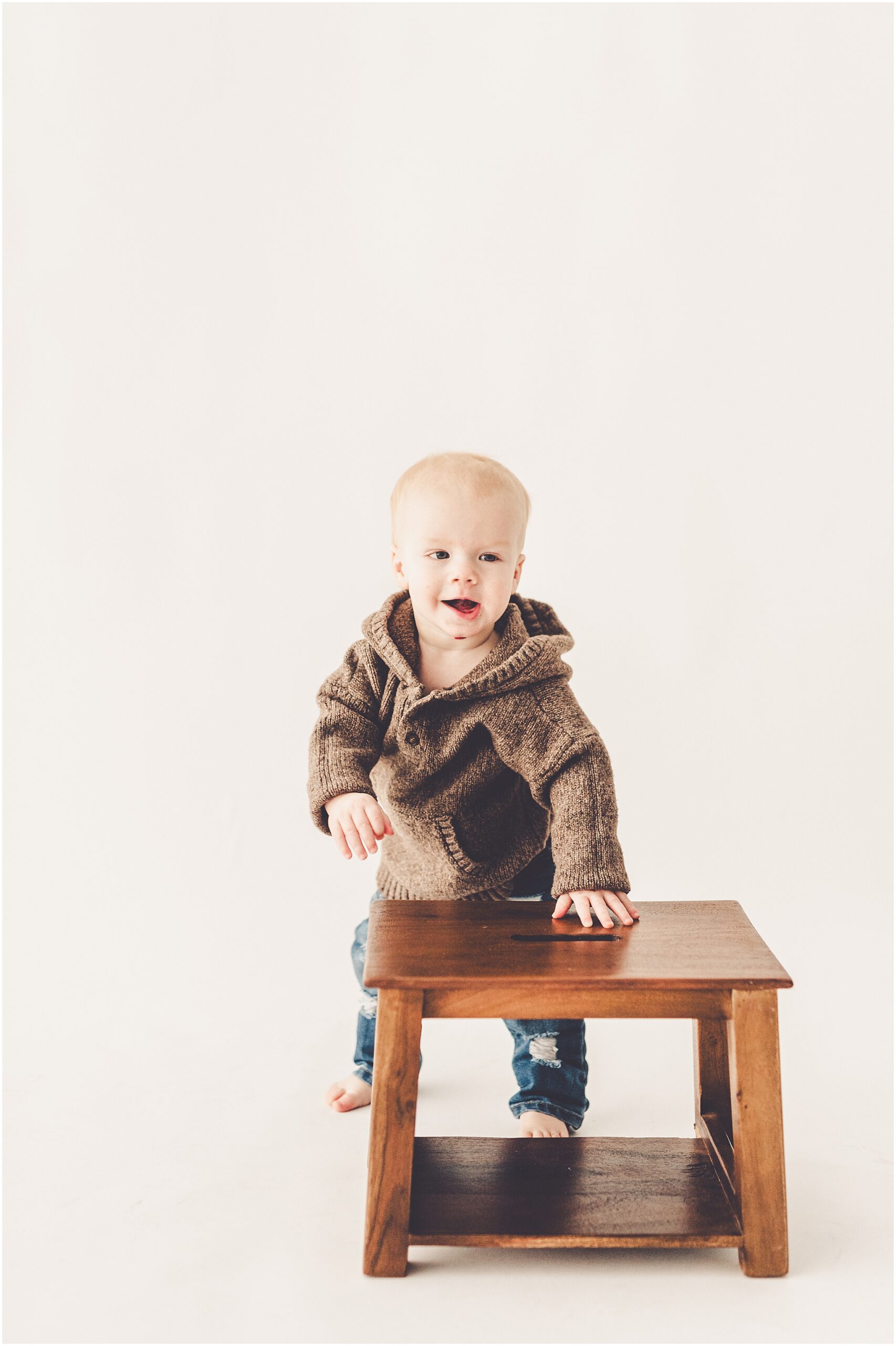 One-year milestone photo inspiration at Studio 388 in Kankakee, Illinois with Kankakee family photographer Kara Evans Photographer.