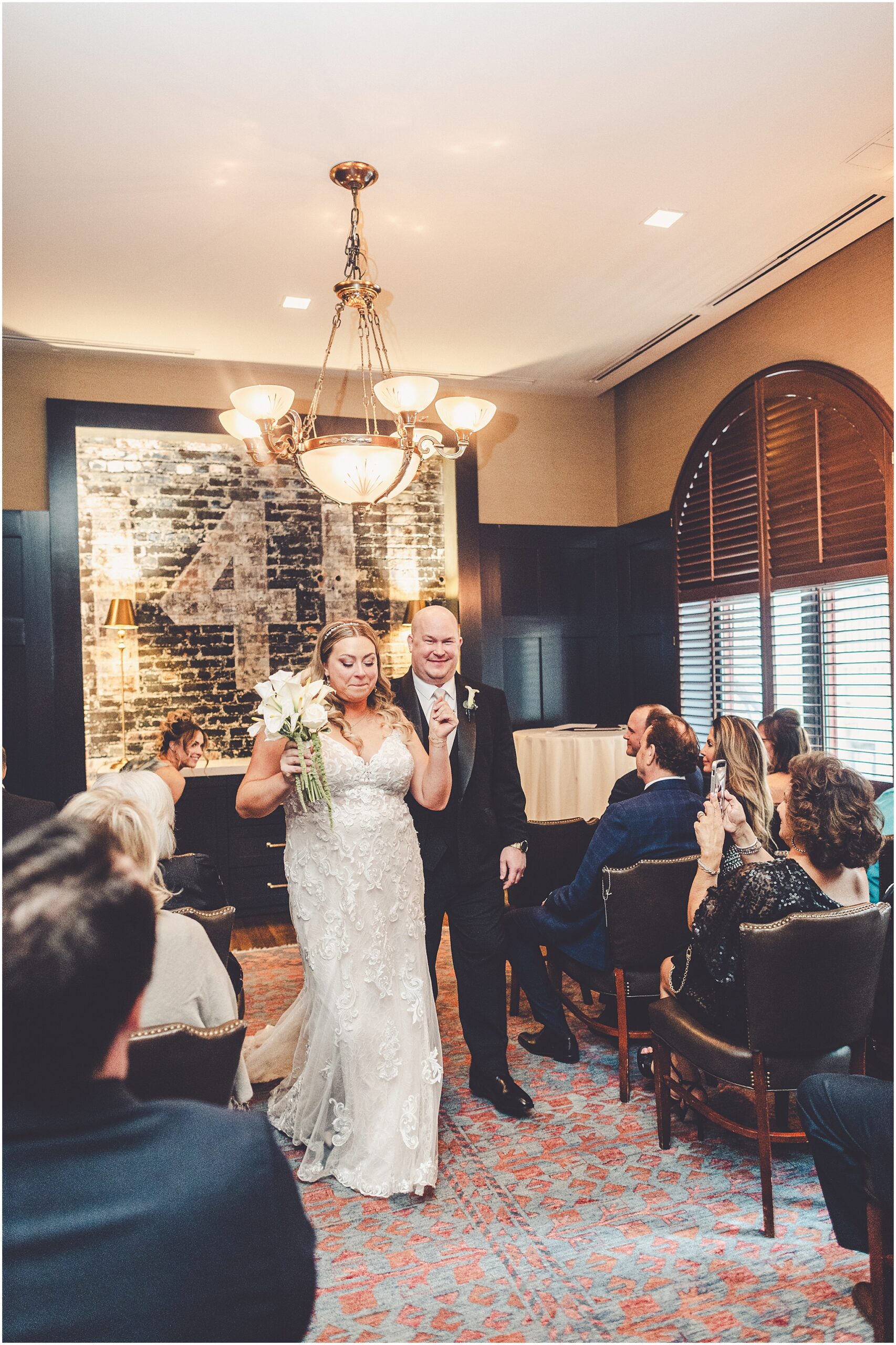 Erin and Vincent's spring wedding day at The Chicago Firehouse Restaurant in Chicago photographed by Kara Evans Photographer.