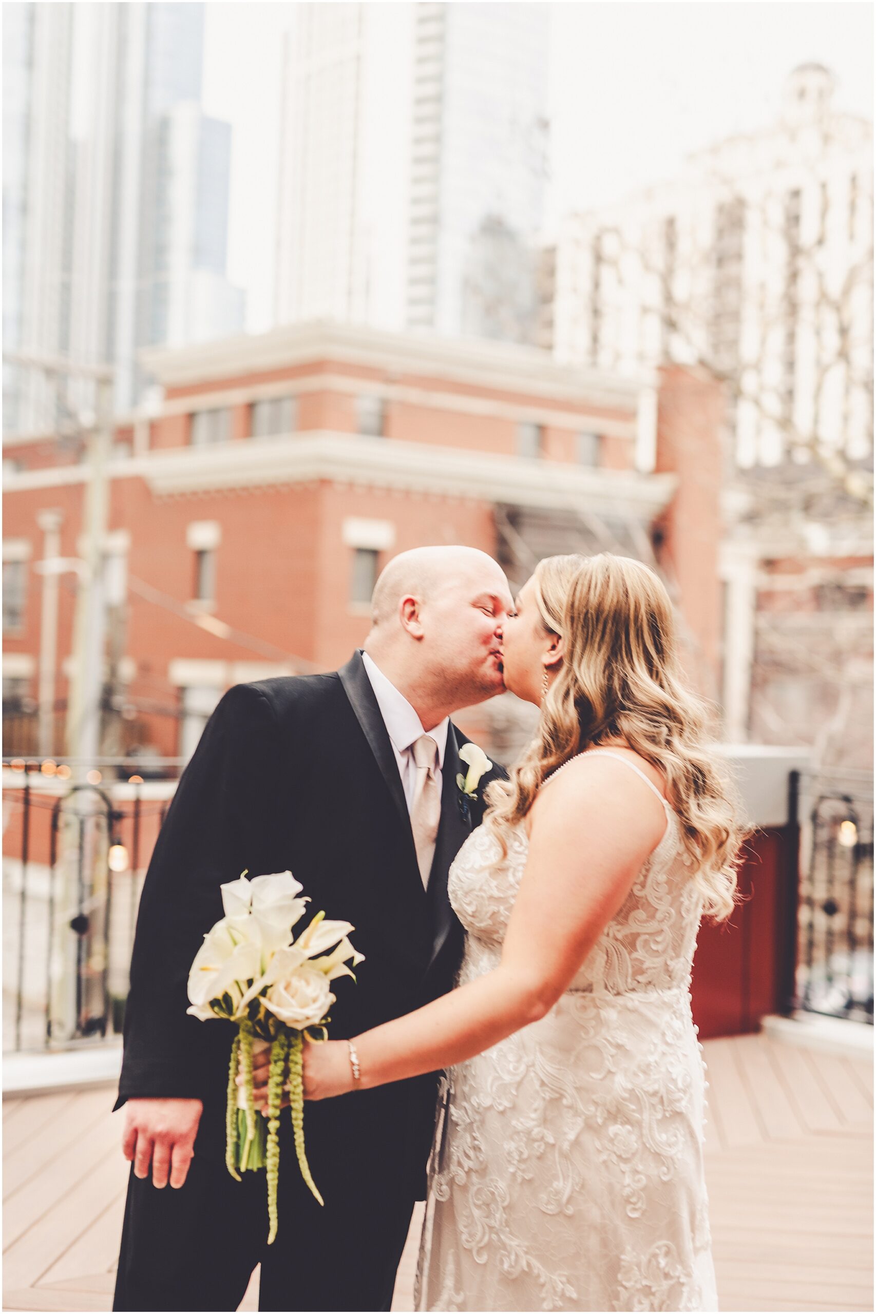 Erin and Vincent's spring wedding day at The Chicago Firehouse Restaurant in Chicago photographed by Kara Evans Photographer.