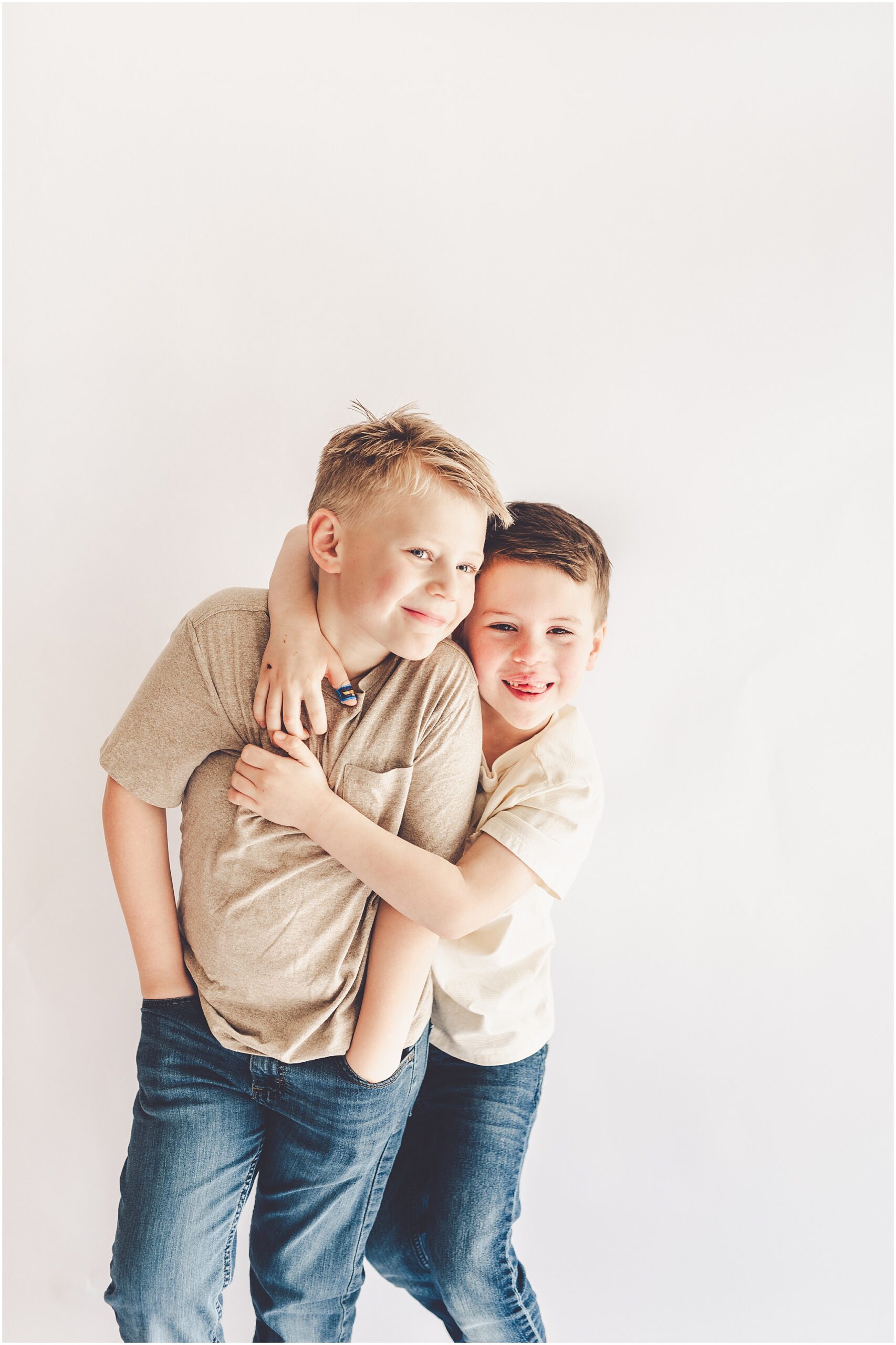 Studio pregnancy announcement family photo ideas with Kankakee family photographer Kara Evans Photographer.