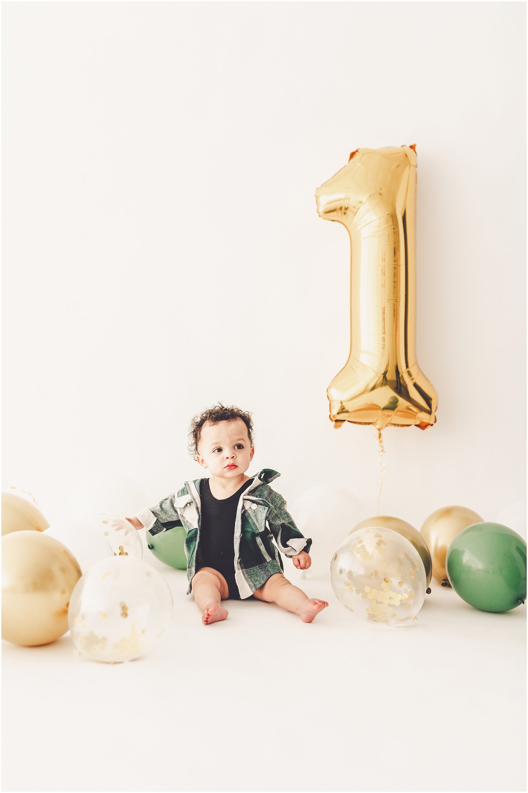 Studio one-year milestone photos at Studio 388 in Kankakee with Kankakee family photographer Kara Evans Photographer.