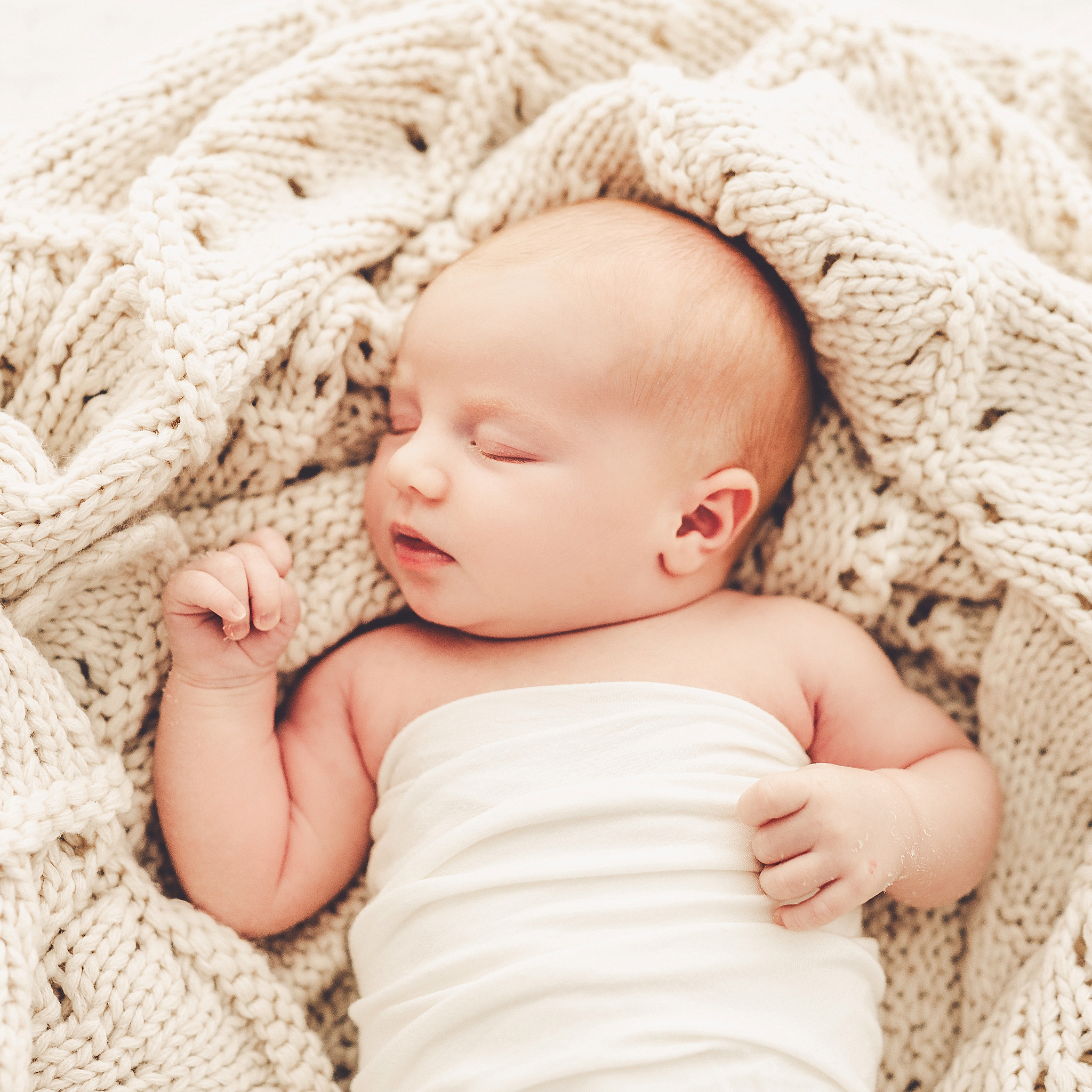 Kara Evans Photographer is a natural light photography studio owner and studio newborn photographer in Kankakee, Illinois.