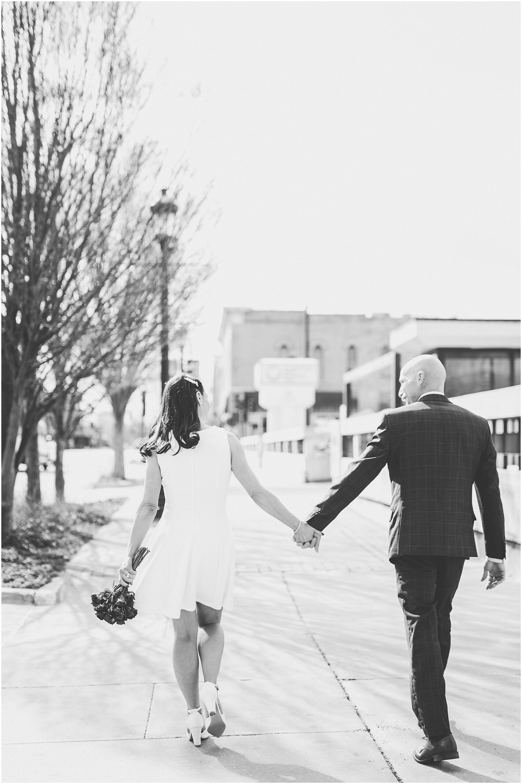 Tania & Zachary's intimate wedding day at Hamilton Walker's in Champaign, Illinois with Central Illinois photographer Kara Evans Photographer.