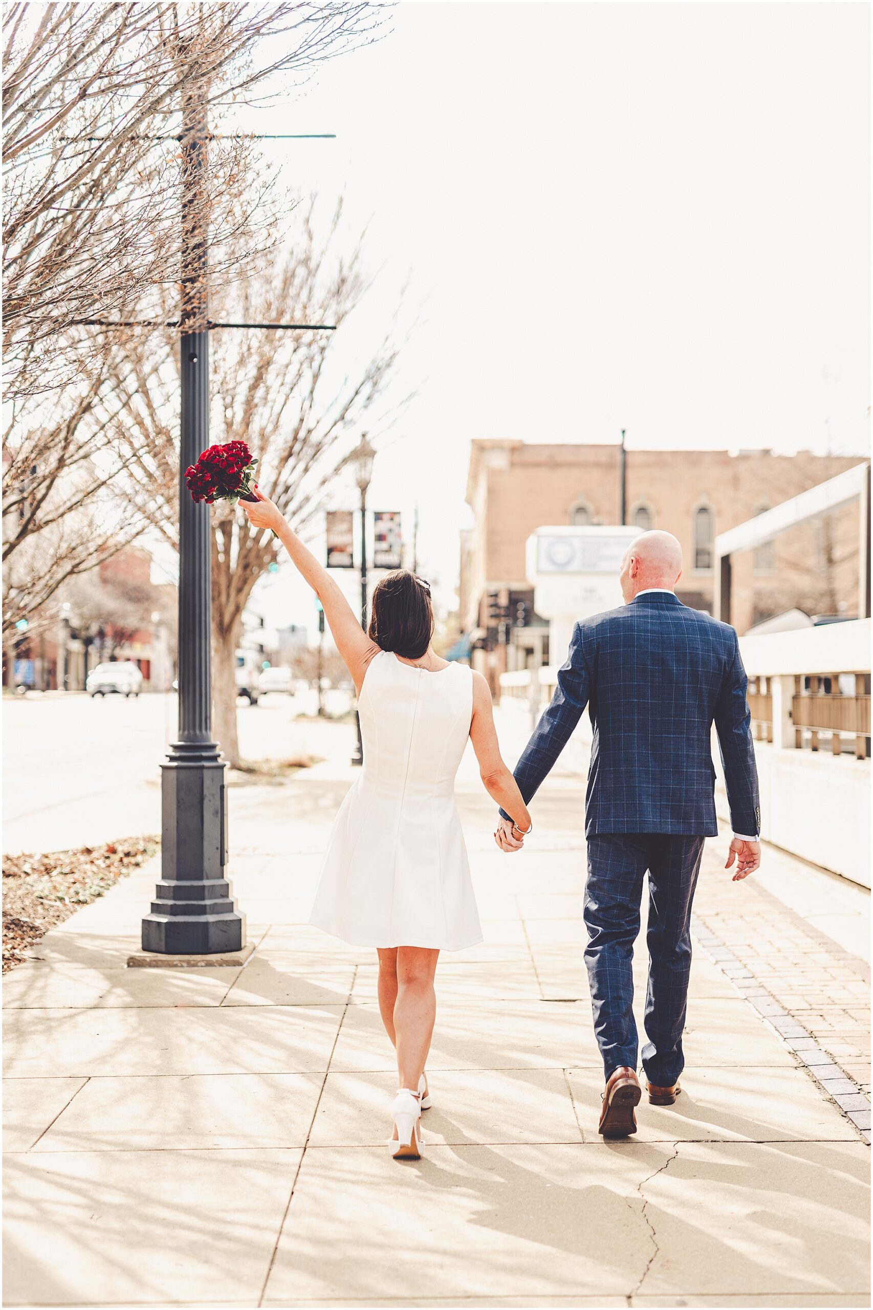 Tania & Zachary's intimate wedding day at Hamilton Walker's in Champaign, Illinois with Central Illinois photographer Kara Evans Photographer.